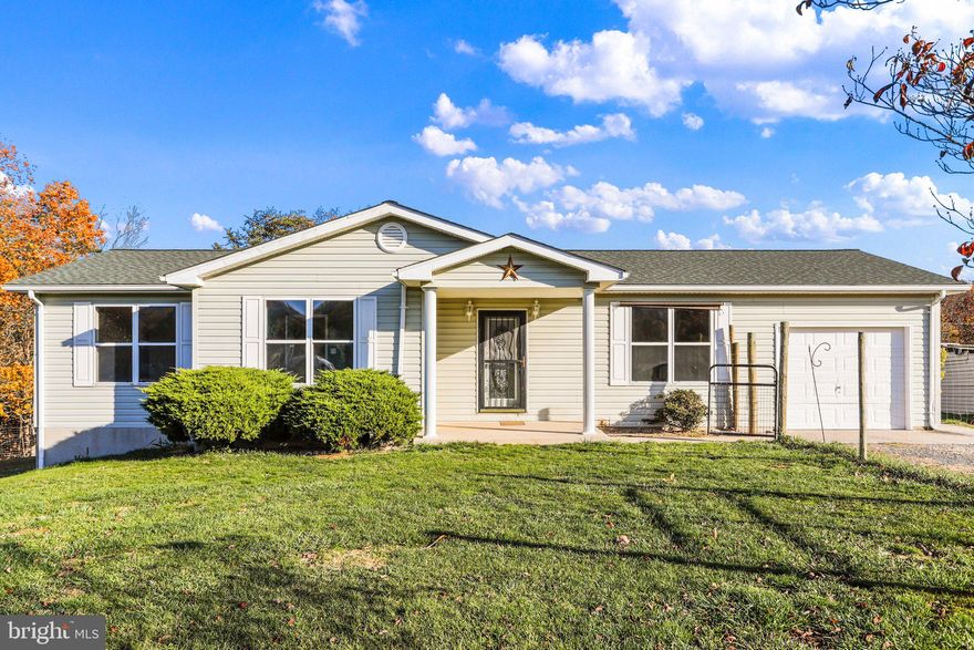 Welcome to this charming one-level ranch home with 3 bedrooms and 2.5 baths, located in a tranquil area. As you step onto the property, you'll be greeted by a welcoming front porch.

Upon entering the home, you'll find a spacious living room with durable and stylish vinyl plank flooring, providing a warm and inviting atmosphere for family gatherings and entertaining guests. The open-concept design seamlessly connects the living room to the well-appointed kitchen, complete with ample counter space and a cozy breakfast nook adjacent to the kitchen offers a lovely spot for casual dining.

The primary owner's suite is a true retreat, featuring an attached private bath for added convenience and privacy.  Additionally, there are two junior bedrooms, both with vinyl plank flooring, that share a well-appointed full bath. These bedrooms are perfect for family members, guests, or can be transformed into a home office or hobby room to suit your needs.

The lower level of the home has been partially improved and is ready for your personal touch. With a side walk-out entrance, this space offers the potential to expand your living area, create a home gym, or design a recreation room to suit your lifestyle.

Other notable features of this property include a 1-car attached garage for added convenience and storage, as well as a storage shed for all your outdoor equipment and gardening needs. The fenced yard provides a safe and secure space for children and pets to play.