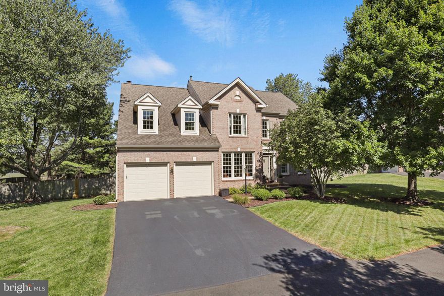 Looking for a fantastic home in a desirable neighborhood? Look no further than this stunning Poplar Park Colonial.  Located on a quiet, cul-de-sac, this home boasts a spacious layout with plenty of natural light.  With 4 bedrooms, 2.5 baths and over 2700 square feet of finished living space, this impeccably maintained home is the one you have been waiting for. 
Enter the home and be greeted by the large 2 story foyer which opens to the combined living and dining room space, perfect for entertaining.  There is also a private home office/library, ideal for the remote, work lifestyle.  As you enter the back of the home, relax and recharge in your family oasis.  This open concept area features a 2 story, family room with brick fireplace, hardwood flooring, a gourmet kitchen and large dining area.  The kitchen offers GE and GE Café appliances, gas cooktop, double ovens, center island and extensive counter and cabinet space.  Other first floor features include a half bath, entrance to the attached 2 car garage and sliding doors from the family room to your huge deck and fully fenced back yard with irrigation system.
Heading upstairs, the primary bedroom features plenty of room for a king-sized bed,  a walk-in closet and en suite bath with separate shower, soaking tub and double sink vanity.  Three more, generously sized bedrooms share the second full bath with a tub/shower.  The laundry room is conveniently located on this level.   
Need more living space?  Head to the basement and design this 1300 square foot (approx.) unfinished space to meet your additional needs.  With full height ceilings, rough in plumbing for a future bathroom and walk out double doors to the backyard, the possibilities are endless.  Create a fully finished rec room, home theater, or guest quarters or continue to use the space as a workshop, home gym and always needed storage.  Thinking about a generator?  The owner has added a manual transfer switch which allows a portable generator to power your home in an emergency.
All of this in highly sought-after Poplar Park with easy access to local amenities, shopping, and entertainment. Whether you're a first-time homebuyer or a seasoned homeowner, this property is a must-see. Don't miss your chance to make this house your dream home!