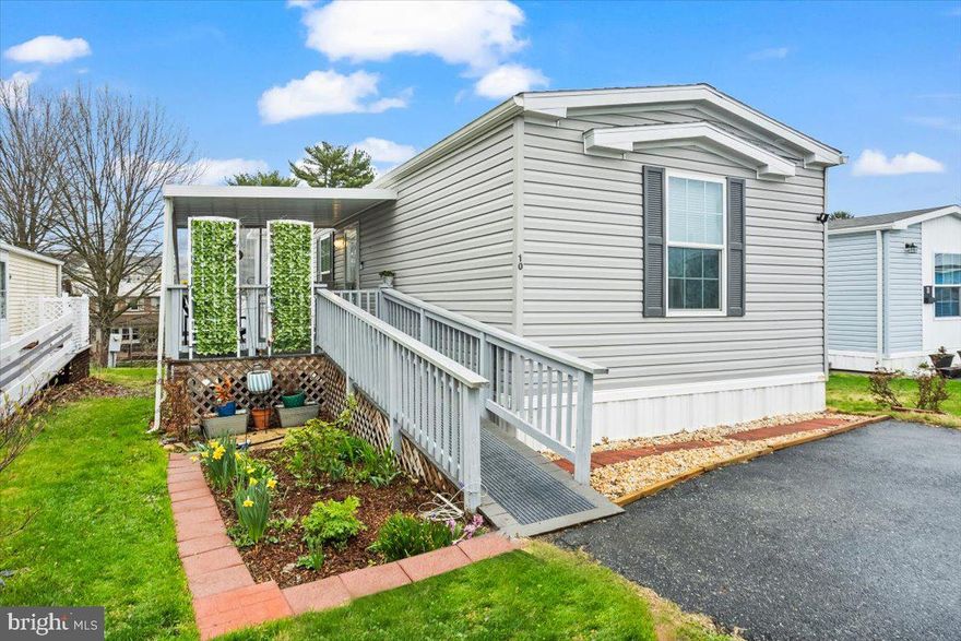 50 + COMMUNITY! Modern Comfort and Convenience at 10 Penn Court, Mount Joy

Welcome to 10 Penn Court—a beautifully maintained 2-bedroom, 2-bathroom mobile home nestled in the heart of Mount Joy. Built in 2018, this bright and modern home offers an inviting open floor plan with contemporary finishes throughout.

Step outside to enjoy the covered private porch, perfect for morning coffee or evening relaxation. Thoughtful upgrades include a wheelchair-accessible ramp, a garden and small yard, and a covered rear landing with stairs for added functionality and charm.

Inside, you'll stay comfortable year-round with propane heating and central air conditioning. Water and sewer services are conveniently covered by the park owner, making day-to-day living that much easier.

Location is everything, and this home is just steps away from the Giant shopping center and minutes from Route 283—offering easy access to Lancaster, Harrisburg, and beyond.

Whether you're downsizing, just starting out, or looking for easy, low-maintenance living, 10 Penn Court is a must-see!