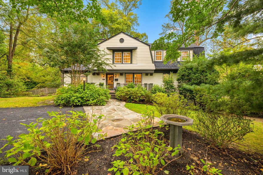 FABULOUS NEW PRICE FOR COVETED FRANKLIN PARK! OPEN SUN 12/7 1P-3P! Welcome to 1830 Massachusetts Avenue, a captivating residence located in the heart of Franklin Park—one of the most desirable and picturesque neighborhoods in the area. Just a short stroll from the newly reimagined Chesterbrook Shopping Center, this exceptional home effortlessly blends timeless character with modern sophistication.

Originally crafted and creatively renovated by the renowned designer Morris Day, this home is a true testament to thoughtful design and quality craftsmanship. The residence is situated on a beautifully landscaped and fully fenced 0.36-acre lot, offering both privacy and a peaceful retreat just minutes from urban conveniences.

Approaching the home, you’re greeted by a charming entry with just three easy steps leading to the front door. Inside, a spacious foyer sets the tone for the open, elegant layout. The foyer flows seamlessly into a formal dining room, perfect for entertaining, complete with a wood-burning fireplace that adds warmth and ambiance.

One of the showstopping features of this home is the cathedral-ceilinged living room, highlighted by stunning stained-glass windows that flood the space with natural light. A second wood-burning fireplace serves as the focal point of the room, flanked by French doors that open to a private backyard oasis. Step outside and enjoy the heated in-ground pool, ideal for both relaxation and recreation, surrounded by mature landscaping that provides beauty and seclusion year-round.

The updated kitchen is a chef’s dream, featuring a large center island, modern appliances, and direct access to the rear deck overlooking the pool—perfect for al fresco dining or weekend gatherings.

The main level includes two generously sized bedrooms and a full hall bath, ideal for guests, family, or a home office setup.

Upstairs, you'll find a spacious and serene primary suite, featuring his-and-her closets and a brand-new, luxuriously renovated en-suite bathroom with modern fixtures and elegant finishes. Two additional bedrooms share an updated hall bath on this level, along with a stunning landing area that offers built-in bookshelves and an expansive open space—perfect for a library, reading nook, or home office.

The walk-out lower level adds even more versatile living space with a full bathroom, abundant storage, and access to a private patio—ideal for multi-generational living, a recreation room, gym, or future guest suite.

Additional highlights include a private driveway with space for four cars, mature trees, and a fully fenced yard offering safety for children and pets alike. This home also falls within the sought-after Chesterbrook Elementary, Longfellow Middle and McLean High School pyramid, making it an ideal choice for those seeking top-tier public education.

Whether you're entertaining by the pool, curling up by the fire, or enjoying the tranquility of Franklin Park, 1830 Massachusetts Avenue offers a truly unique lifestyle opportunity. With its elegant architectural features, updated amenities, and unbeatable location, this property is not just a home—it's a retreat.