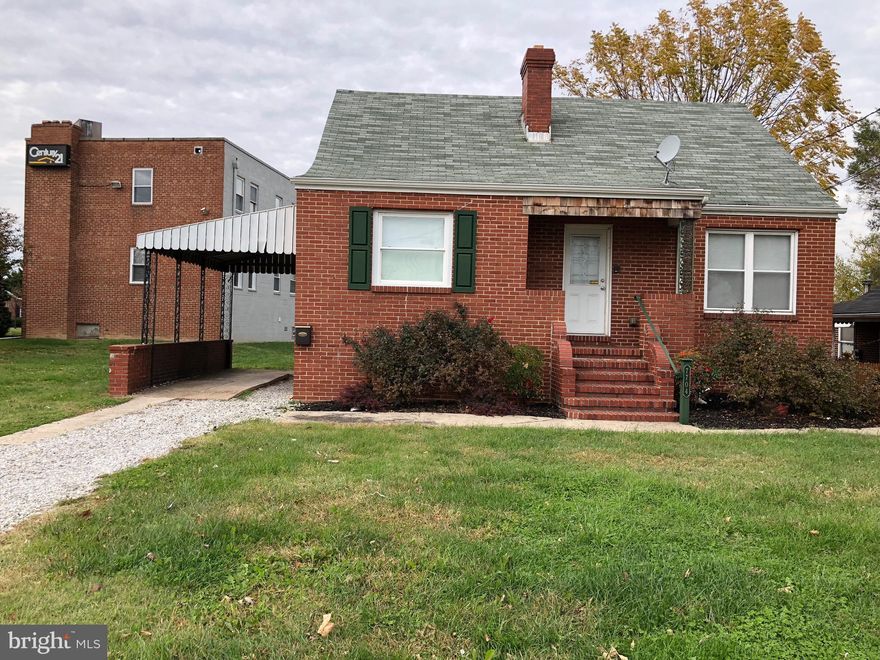 Excellent high traffic location. Currently used as a State Farm office. Has 3  offices, a kitchen area, 1.1 baths,  a reception area, and beautiful wooden floors. Good layout and very clean.  Owner is next door at Century 21. Call owner Gary Hoffer at 443-324-4033 for showings. Looking for long term tenant. Has been used as office for last 10 years.  Tenant pays utilities, taxes and insurance for total of $300/mo. Lots of storage in lower level.