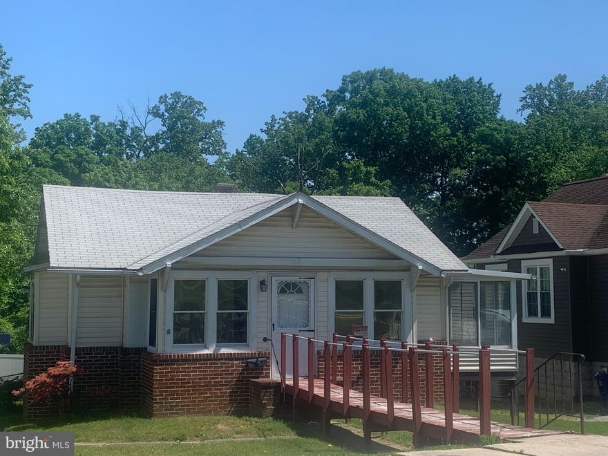 Super location and sweet little neighborhood ready for you to make this home your own. Front foyer/sunroom, side sunroom off one of the bedrooms and rear sunroom off of spacious kitchen with laundry area and  backyard access.  Large living room & dining area with two bedrooms and a full bath, all on entry level w/first floor living ease. Lower level is unimproved but offers rough in bath & outside access. Nice size yard,  partially fenced, large 2 car garage with entry door and overhead door.   This property is being sold AS IS, seller will make no repairs.
Sq.ft may be  incorrect on public record.