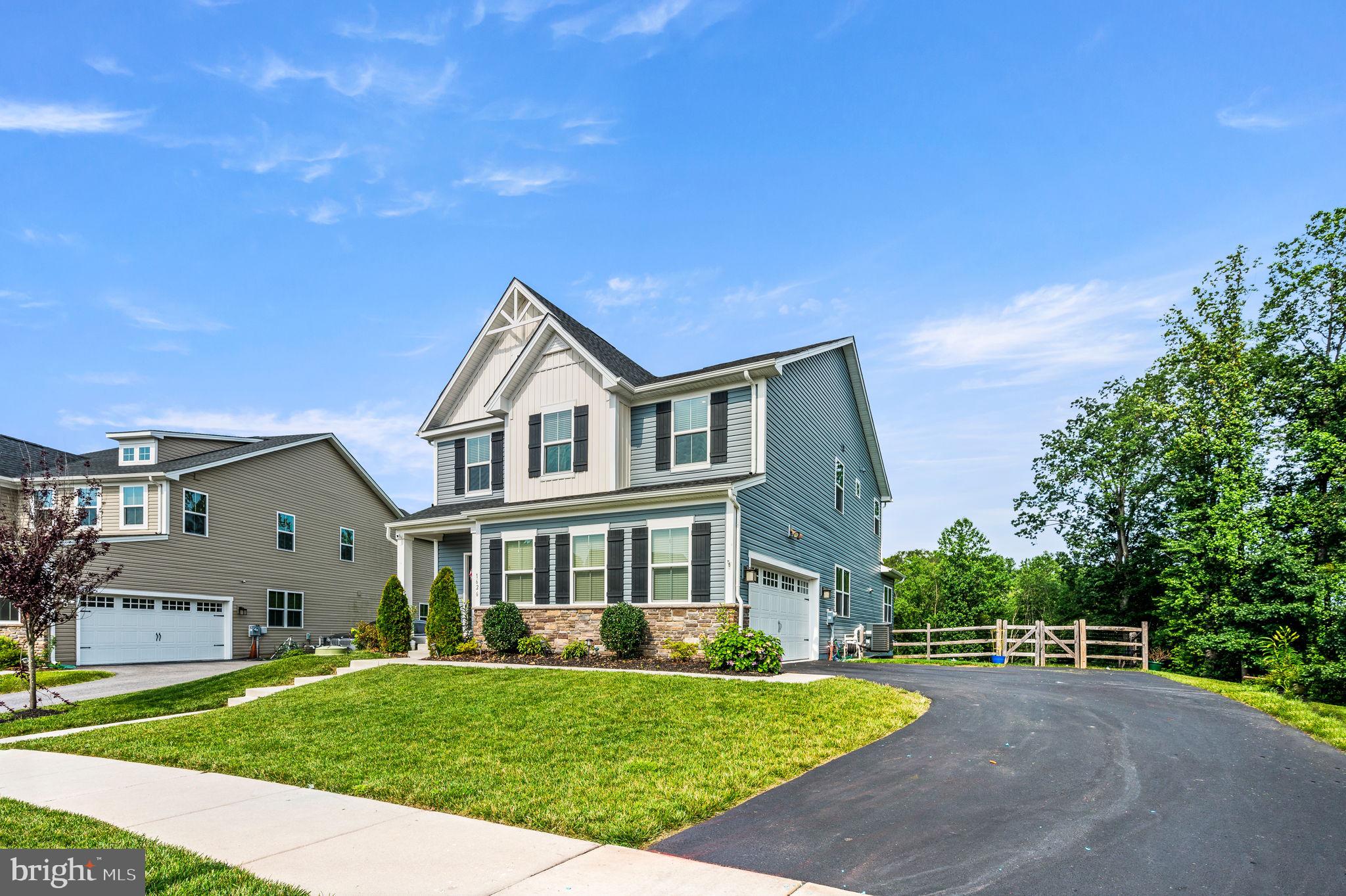 Back on the market due to layoff. Buyer loss is your gain. Gorgeous 4 year old home in Stargazer Village. Hardwoods on 1st floor. Just imagine yourself on the 1st floor deck, overlooking the canopy of trees just outside the development, with their vibrant "firework colors" in the fall! Large master suite with walk-in closet. Three other nice sized bedrooms. Complete with finished walk out basement that has an entertainment center with built-ins, full bath and plenty of storage.