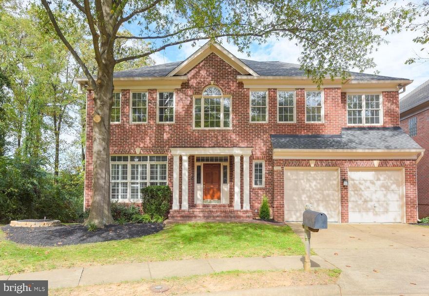 OPEN HOUSE 11/7 is CANCELLED. 5200 Square Foot All Brick Classic in McLean HS School Pyramid is sited on a beautiful cul-de-sac lot next to gorgeous wooded area. Fabulous floor plan & finishes  are timeless and today.  Glowing paint colors, hardwood floors and stunning stone fireplace in the family room, open to the white/SS kitchen with island, are just the beginning.  Main level study sports white plantation shutters and is the quintessential home office or homework room. Recently renovated owner's suite bath is enveloped in Carrara Marble and features a free standing tub & walk in shower. The bedroom boasts a large sitting room, sleeping area with tray ceiling and two walk in closets.  Two secondary bedrooms share a pristine double vanity bath with quartz and sparkling chrome fixtures. The third bedroom is an en-suite with an impeccable quartz-topped vanity and lots of natural light.  And, thank goodness, the laundry room is on the upper level, too ! The walk-out lower level, grounded in luxury vinyl planks, is an expansive hangout space with zones for games, movies, exercise or crafts.  The fifth bedroom and new full bath on this level are tucked away to allow idyllic privacy.
Live the L'Ambiance Lifestyle!   A path in the community allows the kids to stroll to Longfellow Middle School.  The bus stops for Kent Gardens Elementary and McLean High are at the community entrance just a few blocks away.  The smaller, fenced yard means less mowing. There are side walks and beautiful lantern lighting in the community, well known for its fabulous location just moments from downtown McLean, West Falls Church Metro, Tyson's Corner and the GW Parkway & Chain Bridge for access to DC. 
Love the Luxury!  Live the Location!