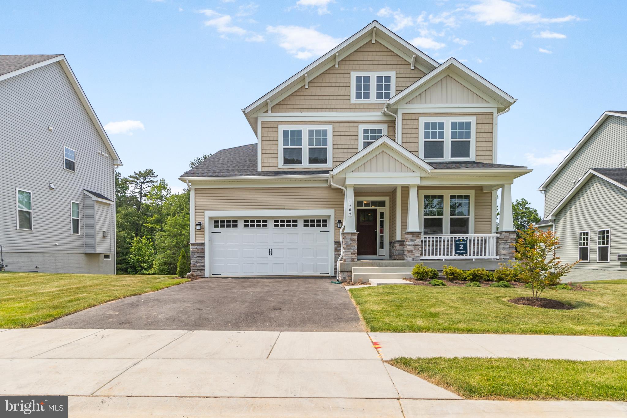 For GPS to community, please use: 1727 Maple Ave. Hanover, MD 21076 **Koch Homes at Copperleaf is offering this gorgeous quick move-in home for June, 2025 delivery! Freshly staged by our friends at Triple Crown, this home is ready for you to move in! Sip coffee on the front porch, or entertain out back on your patio with easy access from the 3-step basement areaway. The inside is lavishly decorated with luxury vinyl plank flooring throughout the main level and upper hallway. Warm up with the Heatilator gas fireplace, or enjoy dinner in the spectacular eat-in kitchen. White painted maple cabinetry with quartz countertops frame the luxurious CAFE series stainless appliances. The morning room lights up the main level surrounded by windows and a vaulted ceiling. Upstairs features 4 bedrooms and 2 full bathrooms. The owner's suite enjoys a tray ceiling, as well as a bath with separate shower and soaking tub. Bedroom level laundry is incredibly convenient, along with numerous closets for linens. This home has an unfinished basement with (2) full size windows and 9' ceilings to really open things up. All Koch homes come with a 3-piece basement bath rough-in for future needs, if they arise. Tours are available right now! Builder provides $25,000 cash towards closing with use of a preferred lender and title agency. Call or email showing contact (Eric Easton) for more information today.