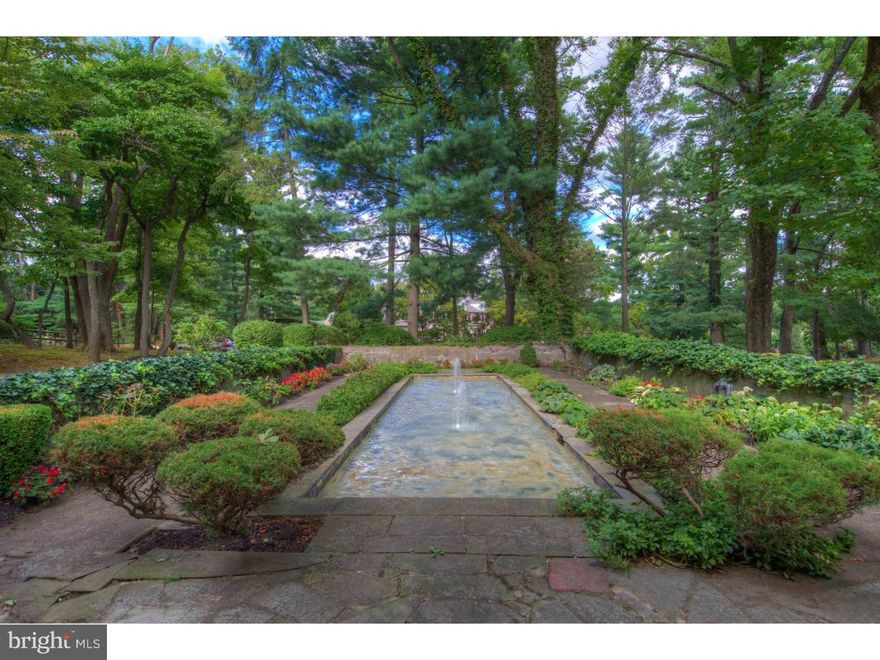 This extraordinary, private 1900's Stone Gardeners Cottage is beautifully landscaped and nestled on 1.26 acres. Completely updated, this residence welcomes you with inspiring architecture and artisanship. The main level of this Villanova treasure features a Center Hall, a welcoming Living Room with fireplace and French doors overlooking a fabulous reflecting pool complete with fountains. A bright and spacious formal Dining Room has crown molding and extended bay windows with deep sills. The well-equipped Kitchen has a breakfast nook; new Granite countertops, double ovens, cooktop & double sink with a door to a lovely side yard. There is a newly renovated hall bath. The spacious window-filled Family Room with gas fireplace, custom cabinetry and wall-to-wall bookcases is a perfect space for enjoying your morning coffee or entertaining friends and family. French doors open to a 'Secret Garden' setting and in-ground Pool with beautifully landscaped level grounds. In addition to the shared living space, a main floor Master suite with an updated marble bath & extra-large walk-in closet complete the main floor.  Take the spiral stairs to the Sitting Room/Exercise Room with a 10 ft round window overlooking the pool. The second floor has three additional bedrooms, a computer room and an updated hall bath with soaking tub and marble shower.  A Guest Cottage with large sunny living room, kitchen, bedroom and newly renovated bath adjoins to a two car Garage with brand new cedar shake roof. There is easy access to the area's major highways and a short drive to The King of Prussia & Plymouth Meeting Malls as well as Center City. Choose from Award Winning Lower Merion Schools or highly rated private schools.  From the instant you walk in, you will know this home was meant to be yours.