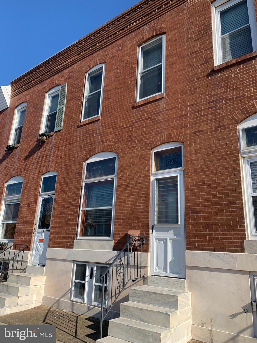 Property needs a full renovation. Over 13 ft wide home with potential for parking. Desirable location. Sold strictly as-is.