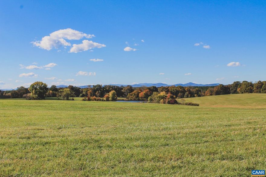 Stunning mountain view lot on over 15 acres just outside of Charlottesville, Virginia. This lot has gently rolling terrain, multiple build sites with expansive mountain views, and frontage along a large, 4.5 acre pond. This lot has been perked for a 6 bedroom conventional drain field with a recent survey recorded. This is truly a turn key building lot for the home of your dreams. Underground electricity available with CVEC, and high speed fiber optic internet available through Firefly.   This is Lot #18 within Oakwater Estates, a new development with high acreage lots in both Fluvanna and Albemarle County. There is no HOA, and bringing your own builder is welcome and expected.   Minutes from renown wineries and approximately 25 minutes from downtown Charlottesville.      The Timbers Group has direct ownership interest in Oakwater Estates. This ownership disclosure is made and pursuant to Virginia Law section 54.1-2138.2.,Lot 18 Oakwater Estates