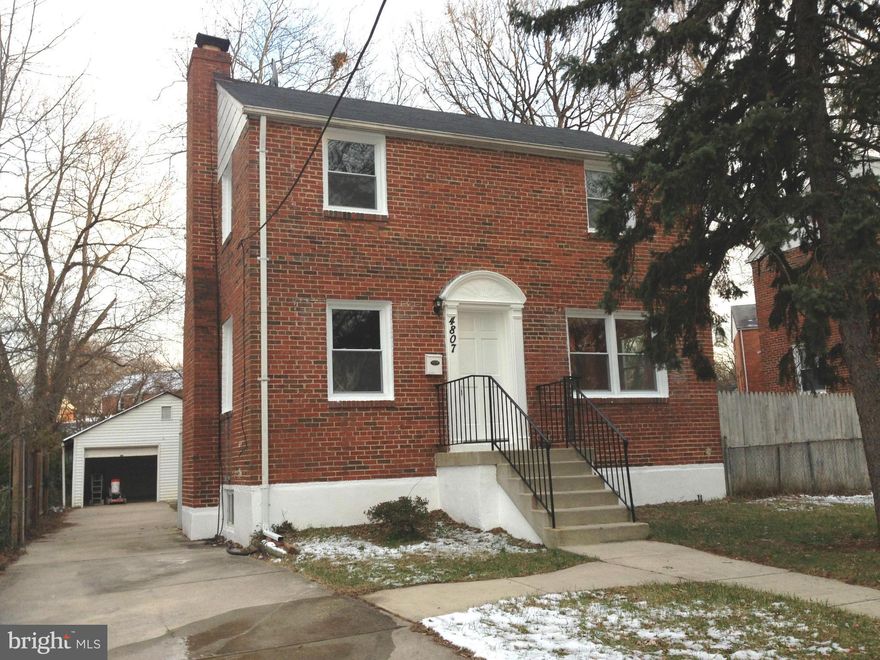 This renovated All Brick Colonial features an Oversized car garage. Fenced yard, Big Driveway for plenty of parking. Refinished Hardwood floor.  Open kitchen w/new cabinets, granite counter top & upgraded appliances.  Cozy living rm w/wood burning fireplace.  Dining rm off Open Kitchen, New AC, heating & hot water heater. New Baths.  Fin. walkout bsmt w/full bath, roomy bedroom, large storage room