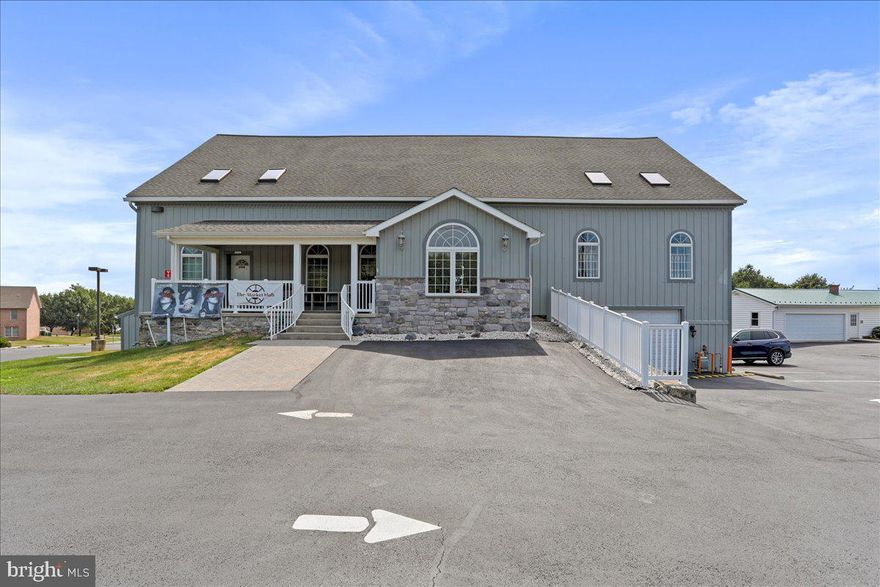 The Barn is a multi-use (PUD/BL) property. Located near I-81, Hagerstown
Airport, and State Line there is great potential for a restaurant to serve this growing community. This 2-story bank barn with a loft has so much potential. The
Barn includes a two bedroom with den, 1 ½ bath (1641 sq foot) Townhouse, a one-
bedroom - 1 bath (966 sq foot) cottage, and over 5000 square foot business
area.  The commercial space holds 5 commercial handicap
bathrooms and a 3-tier handicap lift that goes to all the levels. The lower level of the
barn contains a full commercial kitchen and there is potential on the main level for a prep kitchen that may work for a restaurant.  The  barn is filled with a sprinkler system, security system and HVAC units. All
this still showcasing the 100-year craftmanship of barn construction. Absolutely
stunning!  The neighboring commerical property (the Farmhouse) is also for sale and is available as a package deal if desired.  The Farmhouse is listed under MLS # MDWA2032184.