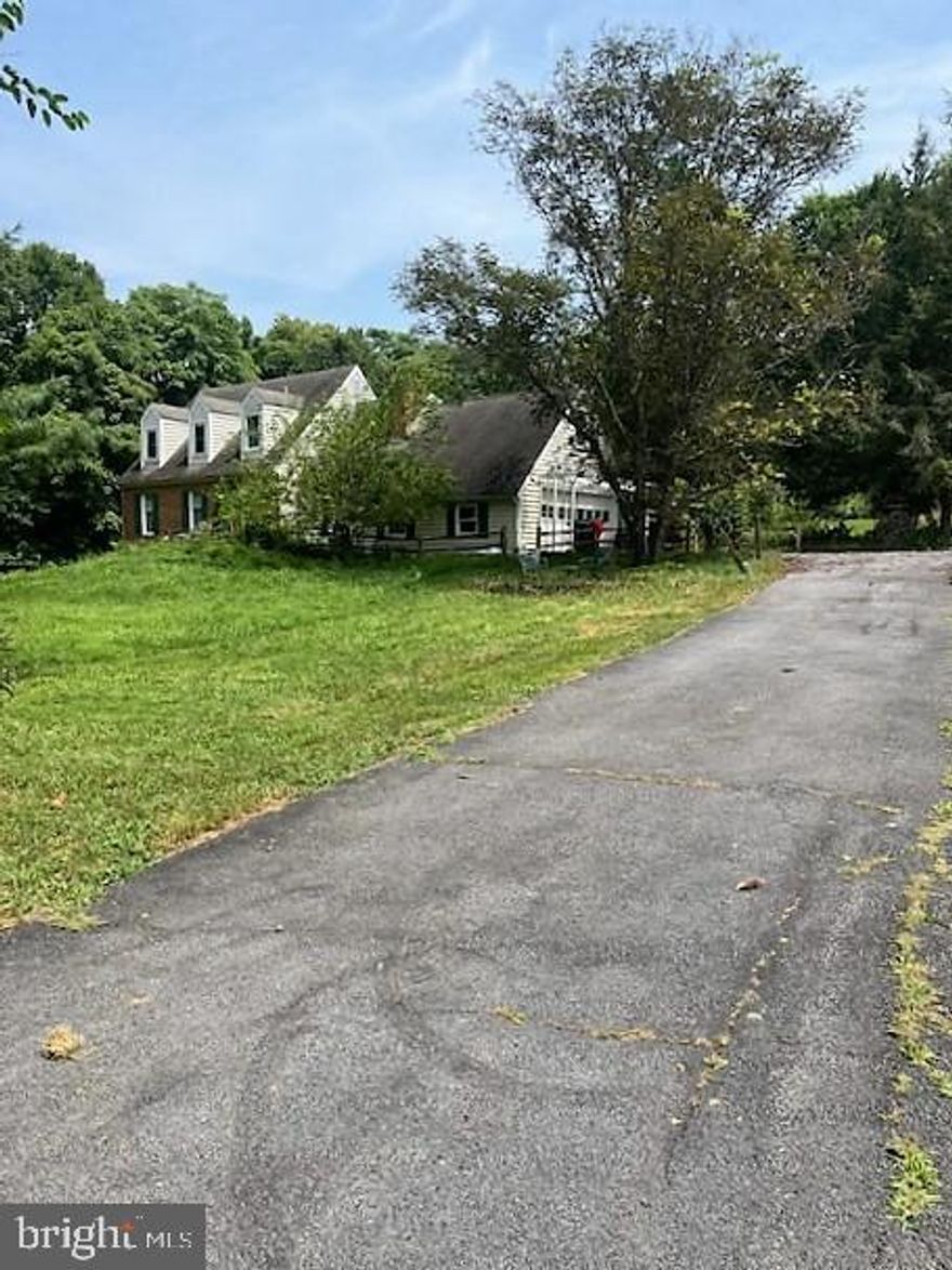 Estate sale-Being offered AS-IS- Seller will not do any repairs or clearing of items in the home/yard -2420 sq ft above grade- 3 bedroom, 2.5 bath classic cape cod with a bonus room on the upper level. 2 car garage- side load. Main level features separate living room , formal dining room, spacious eat-in kitchen with center island and adjoining family room with masonry fireplace.  Full unfinished basement. Evidence of water leakage in basement. Home has terrific bones. Just waiting for a new owner to bring her beauty back. Private large 1.43 acre lot in Sought after Honeywood on the Potomac community. Exterior is over grown but with some TLC -pruning the  mature plantings & unveiling the flagstone patios- this could be a beautiful backyard retreat. Community deep Potomac river access as well as community swimming pool. Conventional and Cash financing only. Close to I-81 , Maryland, Shopping & Spring Mills School District