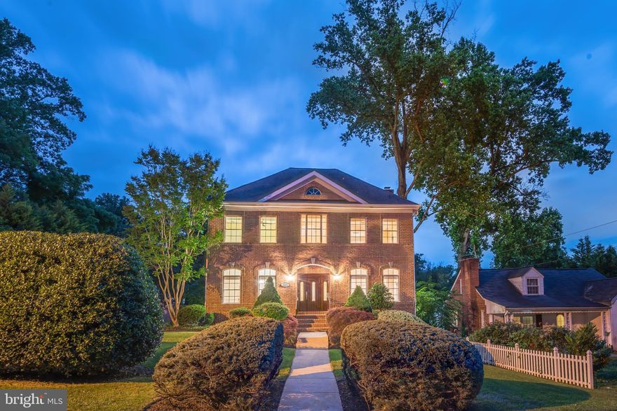 MULTIPLE OFFERS RECEIVED. This property is sure to impress, located in the sought-after neighborhood of Page Hill in Bethesda. Step inside this gorgeous custom-built solid brick colonial by Rembrandt Builders and find over 4,449 sq. ft. of total living space with 4 bedrooms and 4.5 bathrooms. Within the first floor, enter the foyer and be welcomed by solid Brazilian cherry hardwood flooring, recessed lighting, speaker/surround sound system, and crown molding throughout the entire space. This floor includes a living room, family room with fireplace, powder room, and spacious formal dining room with a butler's pantry that connects to the gourmet chef's kitchen with eat-in - which includes top of the line appliances, brand new countertops with a massive peninsula, and a plethora of custom wood cabinetry. The kitchen is ideally placed just steps away from the side entry to the 2-car attached garage, perfectly situated to provide access for grocery unloading. Also found on the main floor are several sets of sliding glass doors that lead to the rear deck, allowing for a seamless connection to the outdoors. Step up to the bedroom level and enjoy 4 bedrooms and 3 bathrooms, with a laundry room for ultimate convenience. Say "NO MORE" to going up and down the stairs to do laundry! The primary suite hosts a gorgeous bathroom with several vanities, an enclosed standing shower, plus a large soaking tub with a tile surround and of course not one, but two walk-in closets plus speaker system. Each secondary bedroom offers a spacious walk-in closet, providing adequate space for all clothes/linens. On the lower level, enjoy a large recreational space with carpeting and speaker system, an additional den and full bathroom, a utility room with a storage area, and a walk-out door to the rear yard. Speaking of the outdoor space - this property has a fenced backyard, a large rear deck, a lower flagstone patio, and immaculate landscaping throughout the entire lot. The extended driveway connects to a sideload 2-car attached garage, allowing for plenty of parking for friends, family, and guests. Located right across the street from the Rochambeau French International School, Bethesda Trolley Trail, and just minutes from Downtown Bethesda, I-495, and I-270, this magnificent home offers an incredible location that creates ease of access to restaurants, shopping, pharmacies, and groceries. Also nearby are plenty of parks, Walter Reed, NIH, Chevy Chase, Rockville, and too many more to name. You do NOT want to miss this amazing chance to live in Bethesda!