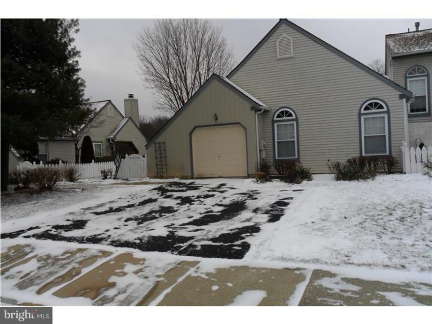 Welcome to this wonderful Huntingdon Brook End Unit.  Step into the living room with cathedral ceiling with octagon window, fireplace, new neutral wall to wall carpet through out main floor, coat closet. Dining room with sliding door to lovely newer deck. Kitchen has new stainless steel dishwasher, refrigerator, microwave and new laminate floor. Main bedroom has cathedral ceiling, 2 large closets, large linen closet and large bathroom with stall shower. 2nd bedroom has ceiling fan, large closet. New hall bath, tile shower and floor. Entrance to garage. Go down stairs to the huge basement/3rd bedroom with sliding door out to patio. Huge storage room with utility closet with a cedar closet. Large laundry room with a half bath. Closets and storage galore in this great house! New hot water heater. Make your appointment today!