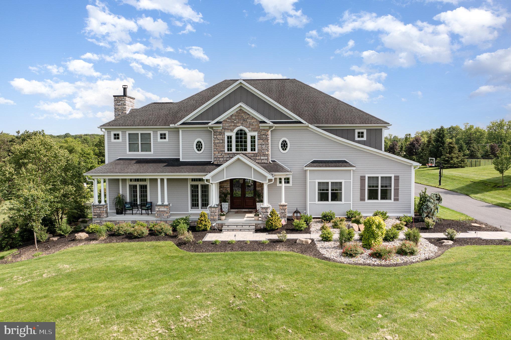 Elegant French-Style Estate in Prestigious Sage Crest! Welcome to your private sanctuary on quiet cul-de-sac of just seven homes. Nestled on 2.25 acres, this 5-6 bedrooms, 4.5 bath exquisite French-style residence offers approximately 6,500 square feet of luxury living with an impressive blend of timeless design and modern comfort. Step inside and discover soaring 10-foot ceilings on the main level and wide hallways throughout. Spacious family room featuring rich hardwood floors, a coffered ceiling, and a cozy wood-burning fireplace. The adjacent chef’s kitchen is a culinary dream, outfitted with double islands, double ovens, a walk-in 12’x6’ pantry, and bespoke cabinetry from RM Custom Cabinetry. A butler’s pantry with additional custom cabinetry and a wine cooler makes entertaining a breeze. The formal dining room is filled with natural light thanks to a wall of windows and sliding glass doors that lead to a covered deck and expansive patio—perfect for indoor-outdoor gatherings. A private 1st floor in-law suite is complete with its own living room with built-in cabinetry, gas fireplace, a spacious bedroom, and a full bath with a roll-in shower for accessibility. Additional main-floor highlights include a mudroom/laundry combo with herringbone tile flooring, custom cabinetry, and built-ins. Upstairs, the luxurious primary suite includes a built-in wet bar, a massive 20'7" x 10'3" walk-in closet, and a spa-inspired bath with a soaking tub, ceramic walk-in shower, and custom cabinetry. 3rd bedroom with private bathroom. 4th & 5th bedroom share Jack-and-Jill bathroom. A potential 6th bedroom is currently used as an office and opens to a 48' x 24' finished bonus room above the garage—ideal for a media room, arts & crafts studio, or game room. 9’ ceilings on 2nd floor. Outdoors, experience a resort-like setting with a newly finished beach-entry, heated saltwater gunite pool featuring water elements (can be controlled from your phone) and extensive hardscaping with built in speakers. A charming gazebo houses a full outdoor kitchen, gas fireplace, and ample bar seating—an entertainer’s paradise with built-in sound for seamless enjoyment. This home is equipped with cutting-edge features including geothermal heating and cooling, a Control4 smart home automation system (installed by Today’s Home & Leisure), and multi-zone built-in speakers throughout. Additional features include 4 bay side entry garage, basement with walkout access-ready for finishing to suit your needs, and matching Amish-crafted outbuilding for lawn and garden storage. Geothermal HVAC system and buried 500 gallon propane tank (not leased). This one-of-a-kind estate offers refined living with every modern amenity in an exclusive setting. Schedule your private tour today to experience all that this remarkable property has to offer.