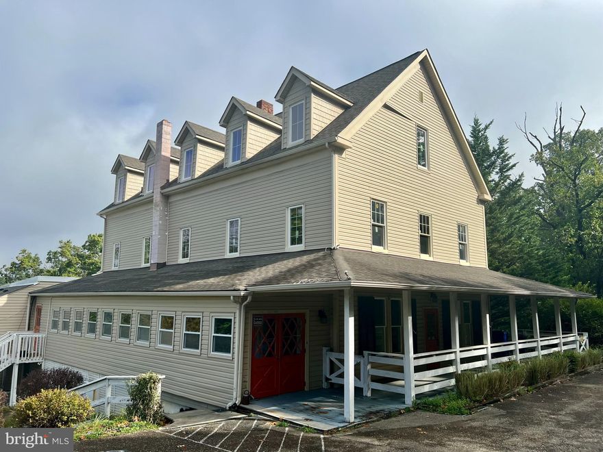 This property presents a good opportunity for investor and/or user. Flexible VC zoning allows multiple uses. Five accessory apartment generates approx. $50,000 annual gross revenue. The property is formerly the Braddock Inn.  Commercial kitchen is in place with hood. Property will require work and is being sold in "As-Is" condition. Parking for 40+ vehicles.