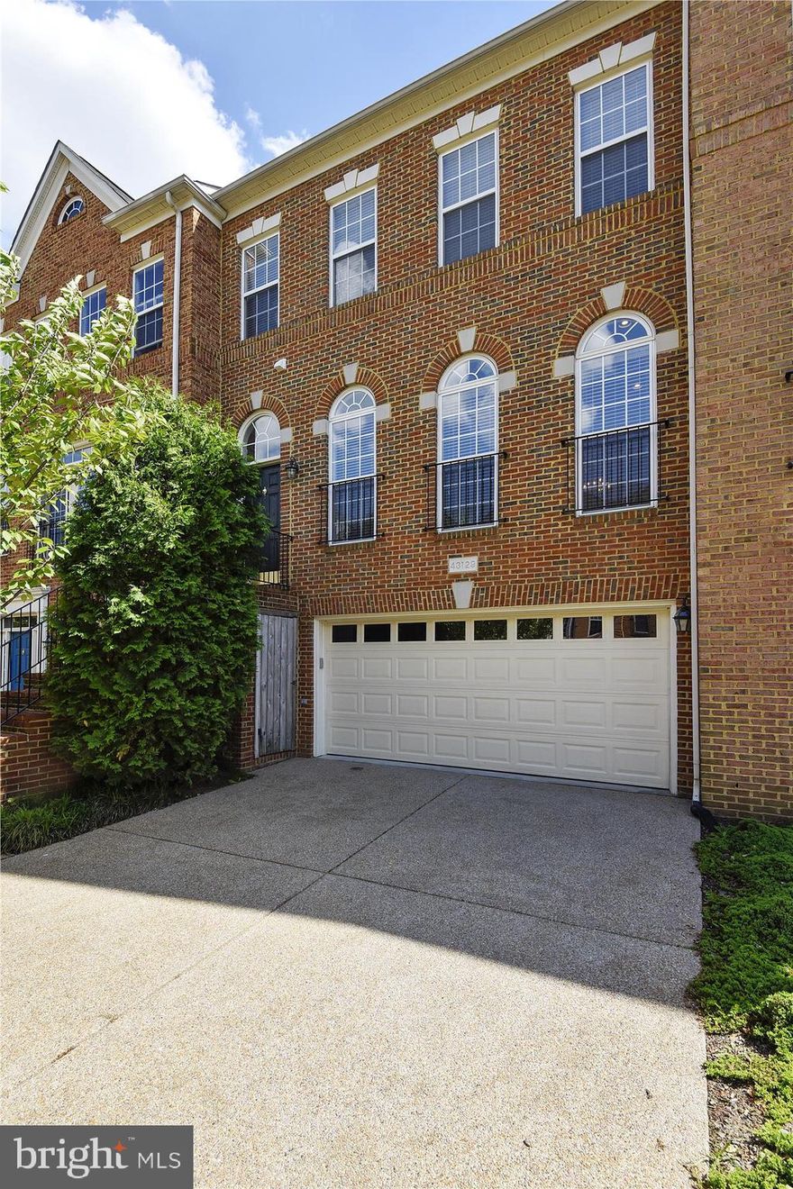 Gorgeous Decatur model 2-car garage townhome in Broadlands. Open floorplan with elevated ceilings and crown moldings. Sunlit-living room with triple Palladian windows. Spacious kitchen with island-bar, abundant cabinetry, double-door pantry, double wall-ovens, gas cooktop, & custom tile backsplash. Family room off kitchen with vaulted ceiling & gas fireplace. Step out from this level onto the spacious Trex deck! Upper level with master suite + 2 addl bedrooms. WOW-newly renovated MBA features a frameless shower with penny tile floor, dual sink vanity with granite, new fixtures, and new tile floor.  LL with walk-out rec room + a half bath that's roughed in for an optional full bath expansion. All freshly painted with new carpet.  New: 16-SEER HVAC with HEPA filter & UV air scrubber; 75-gallon HWH; & insulated garage door. Hardwood floors just refinished.