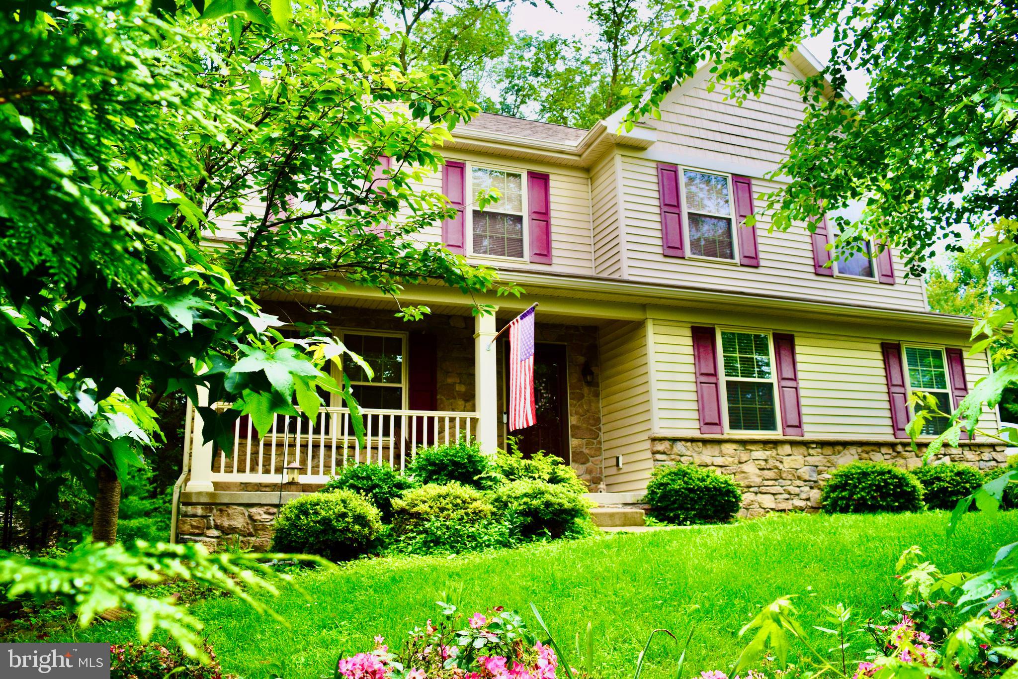 Don't miss out on this stunning and very large 4 bedroom, 3 bathroom home that has been lovingly remodeled inside. Beautiful new kitchen, flooring throughout, newer bathrooms, fixtures, lighting and more! Just off the kitchen is a large screened in porch to relax on with the family watching the wilderness all around you. The basement is just waiting for your finishing touches for even more living space if needed with walk-out sliding glass doors. Home has covered gutters, a newer HVAC system, a whole-house generator! The home is nestled on a wooded lot that provides privacy, serenity ad peacefulness. Mature trees in every direction, open play space for the family in the rear of home, so much area to explore with just shy of 1 acre at .94. This property has so much privacy and is a beautiful place to grow your family! Don't miss out on this beauty!