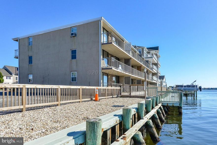 Absolutely spectacular bayfront views from this well maintained 2 bed 2 bath condo.  You almost feel like you are on a ship!  Gorgeous sunsets you just can't beat anywhere. Ductless central heat/ac unit installed in 2012.  Living Room furniture and carpets were done in 2013. Wood burning fireplace makes this condo a cozy year round retreat.  Unit has been a great rental.  Shipwreck offers short term boat tie up for owners on their community dock on a first come first serve basis. Great place to crab and fish as well! Building was painted and waterproofed in 2016.