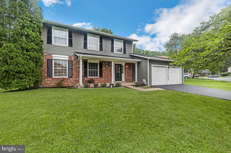 This meticulously maintained Colonial home is nestled on a desirable corner lot within the coveted Lake Braddock and Cherry Run school district. Boasting 4 spacious bedrooms and 2 1/2 baths, this home offers an ideal blend of comfort and convenience. As you approach, you'll be greeted by the home's inviting wide yard with lush green grass and a charming brick façade. The asphalt driveway leads to a two-space garage, providing ample parking. Walk into the foyer and to your left is the living room with new floors flowing throughout the home. Easily move into the dining room with center chandelier. The well appointed kitchen includes stainless steel appliances and granite countertops, perfect for preparing meals. A breakfast nook is the perfect spot to start the morning and includes coffee station and pantry. The family room includes cozy wood-burning fireplace, and sliding glass door to the back yard. On the upper level, the primary bedroom has fresh carpet flooring, offering a peaceful retreat. The private en-suite includes glass stall shower and soaking tub. Three additional bedrooms, with new carpet, and a hall bath completes the level.  The lower level includes a spacious carpeted rec room, laundry with storage space and a bonus room, perfect for home office or guests. Recent updates include New Roof, New Driveway, New Patio, New Primary Bath, New Floors and New Kitchen Cabinets. Located near the Fairfax County Pkwy, this beautiful home is perfect for families seeking top-notch schools and a welcoming community. Don’t miss your chance to make this charming Colonial your forever home. Schedule your viewing today and see all the wonderful features this home has to offer!