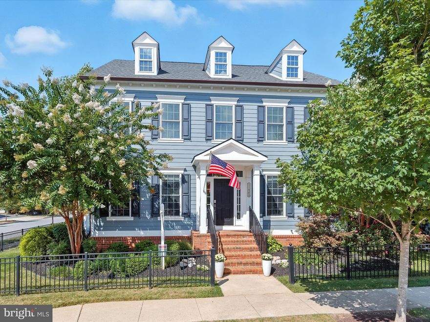 Welcome home to 11480 Iager Boulevard in the esteemed Maple Lawn community! This stately NV Beaconsfield model sited on a corner lot in the coveted Midtown-West District features a fully-fenced large flat yard, a gorgeous custom paver patio, and a three-car garage. Other highlights of this 5-bedroom stunner include a bonus morning room off the kitchen and a rare bonus sitting room with private balcony off the primary bedroom. Fresh paint, brand new carpet and updated designer light fixtures were just installed. Elegant main-level formal living and dining spaces offer a sunny bay window bump-out and abundant millwork and crown molding. The kitchen checks every box with double ovens, a five-burner cooktop and an expansive island. The sun-lit morning room offers a wall of windows and French doors leading to the three-car garage and custom outdoor oasis. The family room features coffered ceilings and a cozy gas fireplace. A half-bath and coat closet complete the main level. 

Upstairs you’ll find a spacious landing area, a generously sized primary retreat, three secondary bedrooms, a shared full bathroom and a laundry room. The primary suite offers two walk-in closets, and a rare private sitting room with balcony. The lower level provides ample entertainment and gathering spaces complete with a built-in bar, sink, beverage fridge and dishwasher. An additional bedroom, full bathroom and storage areas complete the lower level. Ideally located close to all major Baltimore/DC commuter routes, and with enviable amenities including a resort-style community pool, tennis courts, pickleball courts, basketball courts, state-of-the-art gym and more — you’ll quickly see why Maple Lawn is one of the most desirable communities in the region. Don’t let this premiere offering in Howard County’s favorite neighborhood slip away!