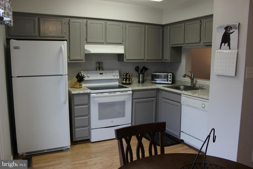 Lovely townhome in convenient location.  This home boasts cleanliness.  Freshly painted with an updated kitchen.  Rare basement to enjoy extra living space.  Spacious bedrooms upstairs.  Enjoy the quiet evenings on the deck with complete privacy.