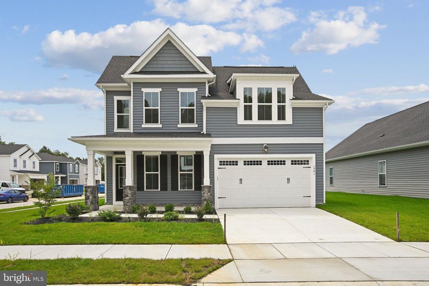 Brand New Torrington with Main Level Primary Bedroom is ready for you to call home! A covered porch extends a gracious welcome, leading you into a home where thoughtful details abound. Throughout the home, the upgraded Artisan interior trim package adds a touch of elegance and sophistication to every room.
Upon entering, discover a flexible living space that can effortlessly transform into a distinguished study/den or a vibrant playroom to meet your evolving needs. The heart of this residence lies in its open-concept kitchen, harmoniously connecting the dining room and family room – an ideal setting for hosting gatherings and creating lasting memories. The main level boasts a striking volume ceiling, and abundant windows  enhancing the sense of spaciousness . The kitchen boasts a central expanded eat-in island, Carrara Morro quartz countertop, and a gourmet stainless steel appliance package with a hood, complemented by Glacier Gray kitchen cabinets and sophisticated matte black kitchen hardware.
Retreat to the main-level primary suite, strategically positioned for utmost privacy. This serene haven includes two spacious walk-in closets and a deluxe primary bathroom featuring a frameless shower door, Carrara Morro quartz countertops, and upgraded cabinets.
Ascend to the upper level which features an alternate layout, and a versatile loft awaits, offering a flexible space for relaxation or recreation. This level also features two additional bedrooms and a full bath. The Torrington offers a seamless blend of luxurious features and practical design, creating a residence that truly feels like home.
Located in Trappe, MD just minutes from Easton, MD, Lakeside at Trappe is an amenity-rich community that allows for daily recreation and easy access to all your needs in Easton, Cambridge, and beyond. Community currently offers a pool, bathhouse with fitness room, ping pong, corn hole, playground and sports courts plus a Bark park. An immersive lakeside experience also in the works!
Please ask about special financing and closing costs!