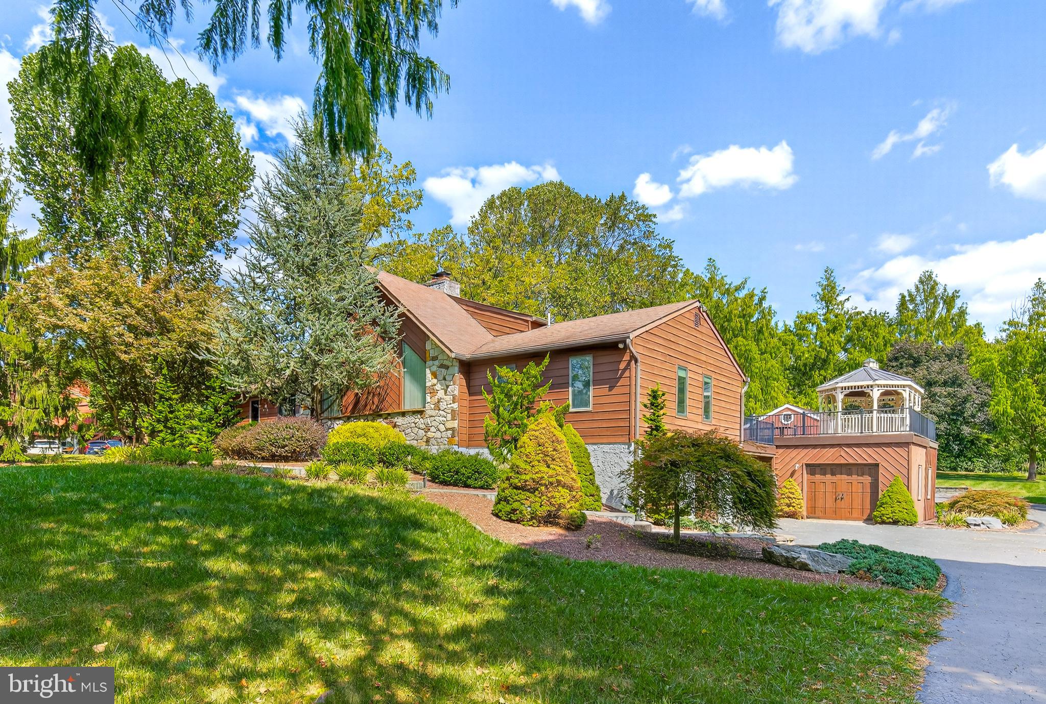 Welcome to 21 Sycamore Lane in the highly desirable Spring View neighborhood of Chester Springs! Homes in this sought-after community rarely come on the market, so don’t miss your opportunity.
This breathtaking 1-acre property offers an abundance of space and versatility. It features an attached oversized 2-car garage, a detached shop with a single garage door, an additional detached 4-car garage/workshop, and an 28' x 14' shed—perfect for hobbyists, car enthusiasts, or anyone in need of extra storage.
Inside, the home has been meticulously maintained with timeless details, including rich white oak hardwood floors with a cherry wood insert and custom cherry kitchen cabinetry that will delight any culinary enthusiast. The chef’s kitchen also boasts a Sub-Zero refrigerator and wine cooler.
The primary suite includes a walk-in closet, ensuite bathroom, and a walk-in tiled glass shower. Two additional bedrooms are conveniently located on the main level, along with a recently remodeled full guest bath. Upstairs, the loft provides an airy, flexible space—ideal for a home office or even a potential fourth bedroom.
The finished lower level offers brand-new carpet, a half bath, and plumbing already in place for a future wet bar. Outside, thoughtfully designed hardscaping creates both beauty and low-maintenance convenience.
Schedule your private showing today and see why 21 Sycamore Lane could be your dream home!