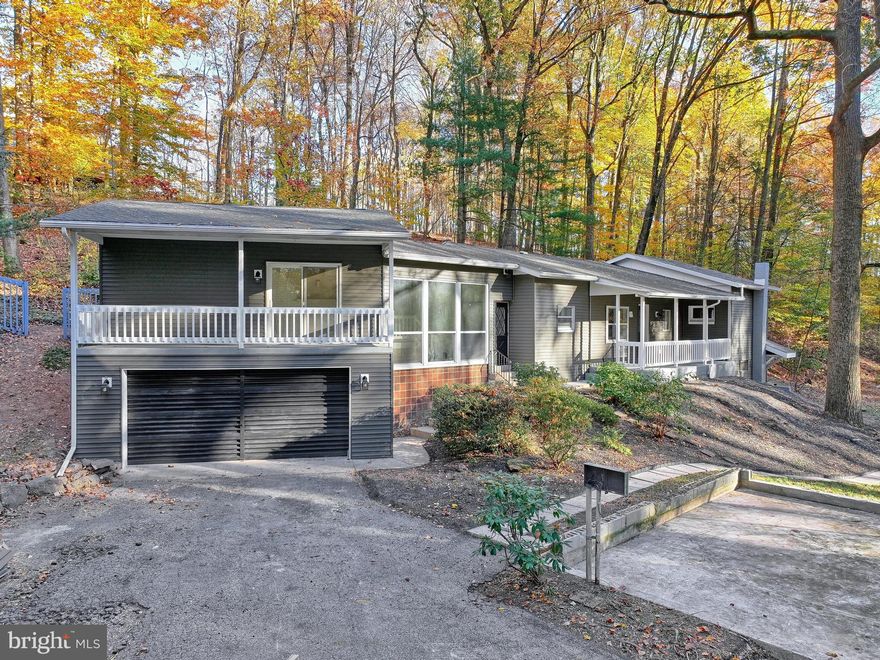 Nestled on a serene 1.84-acre wooded lot, this truly unique property offers the perfect blend of privacy, modern upgrades, and natural beauty. Conveniently located between Harrisburg and York, Pennsylvania, this charming home spans over 1,930 square feet and features three spacious bedrooms and two fully renovated bathrooms. The home has been thoughtfully updated throughout, boasting brand new luxury vinyl plank flooring, plush new carpeting, and a modern kitchen equipped with top-of-the-line finishes and contemporary cabinetry. Both bathrooms have been stylishly redesigned to offer a fresh, spa-like experience.

One of the standout features of this home is its stunning entryway, which welcomes you with a working pond and tranquil water feature, creating a serene first impression. The outdoor living spaces are just as impressive, with two private decks and a large entertainment deck complete with a covered pavilion—perfect for hosting guests or simply relaxing in the peaceful surroundings. A gentle stream meanders through the property, enhancing the natural ambiance and offering a picturesque backdrop to your everyday life.

Located in the highly sought-after Redland School District, this home combines seclusion with convenience, providing quick access to nearby amenities, commuter routes, and excellent schools. Whether you're looking for a quiet retreat or a stylish home for entertaining, this property delivers on all fronts. Don’t miss the chance to make this one-of-a-kind haven your own.elivers on all fronts. Don’t miss the chance to make this one-of-a-kind haven your own.

Disclosure attached. Please also add the attached paper work about inspections.