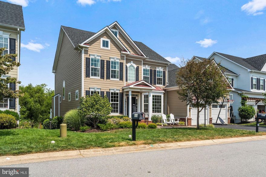 Welcome HOME to Kinvarra Place, one of the LARGEST models in Village Case. This stunning Carrington built home has been thoughtfully updated and shows even better than a model home.  With nearly 5400 square feet of finished living area on three levels, you will love every square inch of this property. Hardiplank siding and metal roof on the covered portico and bay window for a gorgeous front elevation. When you first enter the home you will notice the lovely HW floors and crown molding that grace the entire main level.  You will love the white cabinets, granite countertops, and large center island of the gourmet kitchen which extends into the family room and breakfast room/morning room, and the office nook just off the kitchen that helps to keep everything in its place with amazing built-ins and a desk. This home also boasts the main level primary owner's bedroom suite with his and her closets, a luxurious bathroom with dual vanities plus additional vanity with tons of storage. The main level also has a formal living room and separate dining room with custom built-ins, and a dedicated laundry room/mudroom area.  On the upper level, you will find continual HW floors run up the stairs and into the hallway.  An additional owner's suite with a large bathroom with dual vanities, plus 2 additional HUGE bedrooms that share a hall bathroom.  The lower level has been converted into an in-law suite with separate walkout entrance, large floor to ceiling windows with a full kitchen, full bathroom, and large open area plus a bonus room.  A gorgeous screened-in porch with stamped concrete floors looks out onto your protected views of common area and an idyllic pond. You will also enjoy the views from the Trex deck with hookup for propane to the gas grill and an automatic awning that effortlessly brings you full sun or lovely shade as you are outdoor. This home truly has it all, with an amazing location in sought after neighborhood in the town of Purcellville, convenient commuter location, and can easily walk to shops, restaurants, and town events.