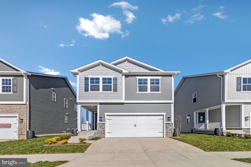 WITH RATES BEING OFFERED UNDER 5% YOU CAN BUY THIS BRAND-NEW HOME READY FOR IMMEDIATE OCCUPANCY FOR THE SAME P&I PAYMENT AS A $545,000 RESALE! This brand-new 4-bedroom, 3 1/2 bath Lynette by Richmond American Homes. The main floor of this charming Lynette plan offers an inviting great room with an electric fireplace, mantel, Mohawk luxury vinyl plank floors on the main level, 9' ceilings with 8' doors, a powder room, gourmet kitchen with a convenient island, quartz countertops throughout, backsplash, pantry with wood shelves.  Beautiful Oak Stairs take you to the top floor, you’ll find four elegant bedrooms, including an impressive primary suite showcasing a roomy walk-in closet and a deluxe bath with double sinks. A secondary bath, top floor laundry room, 2-garage with electric vehicle charging station, video doorbell, kwikset locks, sidewalks throughout the community, and a finished basement with 9' ceilings, rough-in for wet bar and a full bathroom complete this home. Enclave at Arundel Hills is an exciting new community in Glen Burnie. It offers easy access to major employers in Baltimore, Annapolis, and Washington D.C. via I-695 and I-97 and is located just minutes from Fort Meade. Residents can also appreciate close proximity to BWI, countless dining options and minutes to waterfront restaurants, and entertainment options. Choose from an attractive array of single-family homes, each boasting the designer details and in-demand features today’s homebuyers are seeking! Model is OPEN but visitors are encouraged to call ahead to be guaranteed a dedicated appointment.