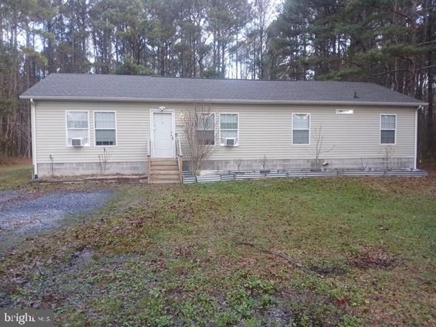 Looking for simple living in a country setting with some property? This 3 bed 2 bath well designed stick built home sits on over 4 acres. With the primary bedroom on one side and a separate area for the 2nd and 3rd bedroom on the other side, along with a second living area, its perfect for the buyers that want a quiet bedroom to retire to. The large kitchen and adjacent laundry area combine with the living areas for that open concept look.