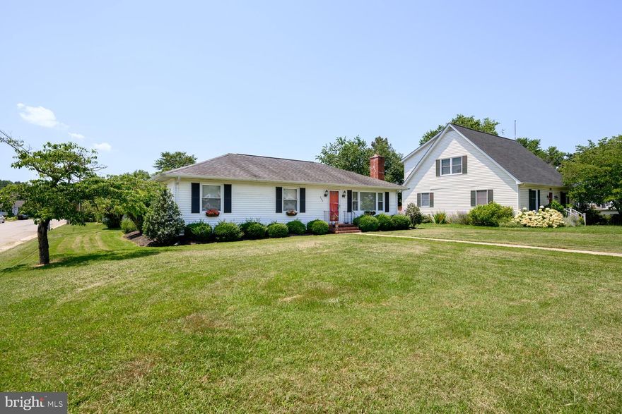 Welcome to 332 Holly Street, a delightful 3-bedroom, 1-bath rancher nestled on a spacious corner lot in the heart of Centreville. This single-level home is the perfect blend of classic charm and thoughtful updates, making it ideal for first-time buyers, downsizers, or anyone seeking low-maintenance living.

Step inside to find a warm and inviting living room, where original hardwood floors flow throughout most of the home. A cozy fireplace is framed by timeless knotty pine built-ins, adding character and comfort to the space. The updated kitchen boasts sleek stainless steel appliances and new LPL flooring that continues into the laundry area for a modern touch.

The bathroom has been tastefully renovated, maintaining the home’s charm while offering today’s conveniences. Efficient HVAC keeps the home comfortable year-round, with a backup oil burner for extra peace of mind during colder months.

Outside, a large detached storage building offers endless possibilities – perfect as a workshop, art studio, or the ultimate he/she shed. The paved driveway provides ample parking for two or more vehicles.

Enjoy the convenience of in-town living with easy access to major highways in every direction. Whether you're starting out, starting over, or simply simplifying, this lovingly maintained home is a great place to call your own.