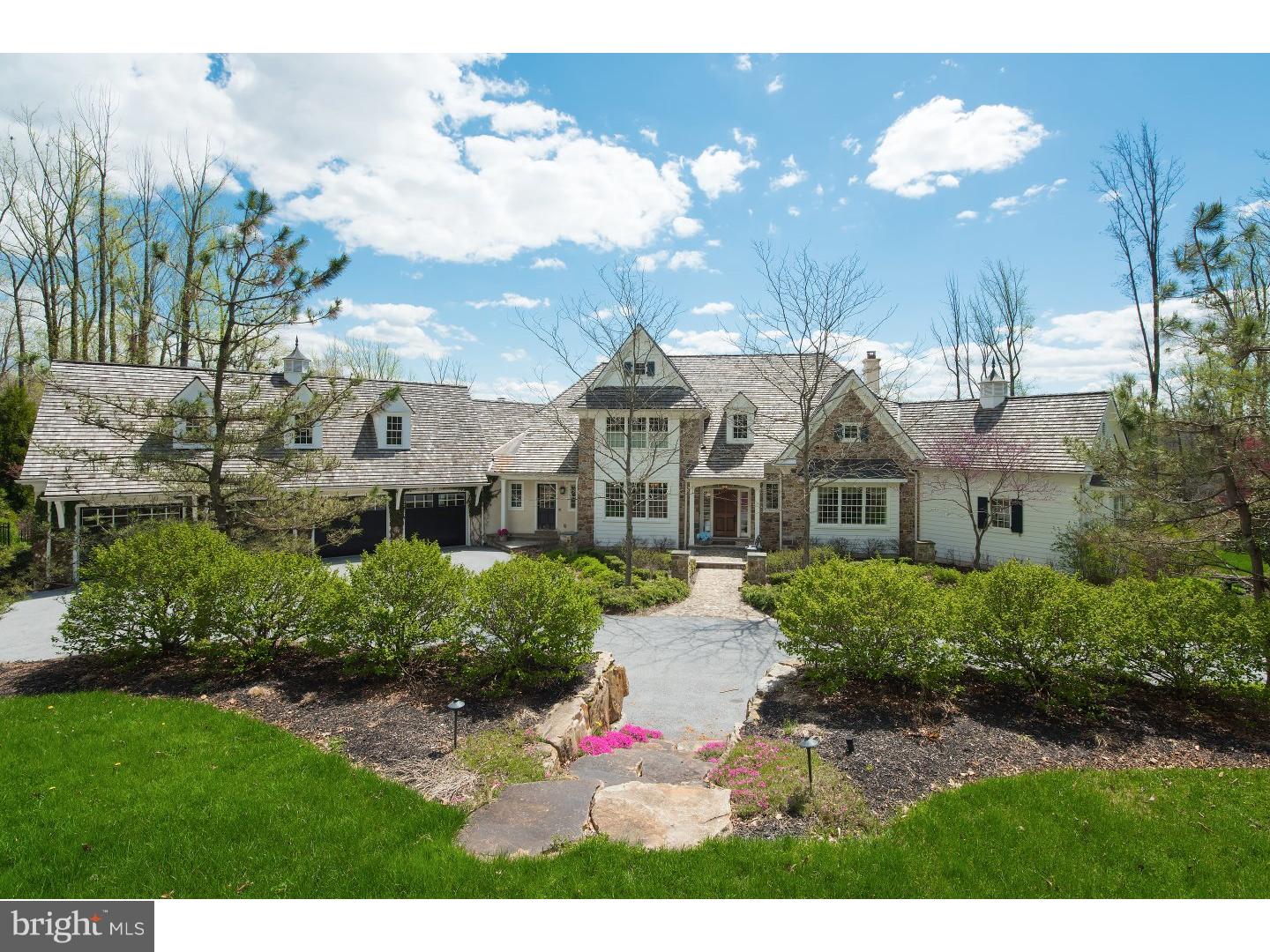 "BLACK HORSE CREEK FARM" is the ultimate in country living. This magnificent property is adorned by two running streams that flow into four lovely ponds. The 6500 - sq ft/ home was built by a local custom builder know for his high quality construction, The interior finishes of Black Walnut flooring, custom kitchen cabinetry, complete with authentic masonry, pizza oven and abundance of specialty moldings and trim details, are but a few of the many luxury, lifestyle features. The four car attached garage and whole house generator add to this special offering. The lower level overs a full wet bar, game area, full bath and theater area. Additional luxury features found in this home are a large wine room, state of the art sound system and a lovely screened porch overlooking the pool. The open and wooded grounds are enhanced by, mature woodlands, extensive white fencing, manicured lawns and a regulation riding ring and small barn. Tucked away, yet conveniently located, is a spectacular pool/spa retreat, complete with black bottom pool with popular vanishing edge, overlooking the scenic views that are also observed from every window throughout the house and the grounds.