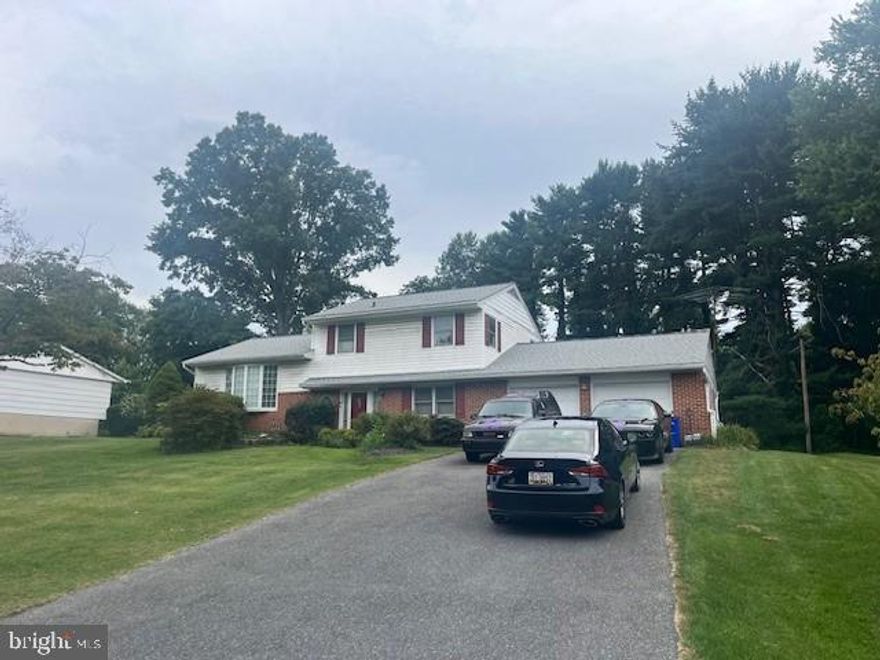 Welcome to this charming split-level home, nestled on a sprawling .56-acre lot in Ellicott City. Built in 1966, this classic single-family residence exudes timeless appeal with its distinctive brick front, offering a warm and inviting curb appeal.  The expansive yard is a true gem, offering a serene escape and endless possibilities for gardening, recreation, and outdoor living. The generous lot size ensures privacy and plenty of room for outdoor activities.

Step inside to discover a functional and comfortable layout. The main level features a cozy den and a spacious family room with a half bathroom, providing plenty of room for relaxation and entertainment.  Step up to a sun-filled living room, a dining area for gatherings, and a well-appointed kitchen. The home offers three spacious bedrooms on the third level with one full bath providing ample space for family and guests.  The unfinished basement provides a blank canvas for a home gym, recreation room, or additional storage. 

A standout feature of this property is the two-car attached garage, providing secure parking and additional storage space.

Located in a sought-after Ellicott City neighborhood, this home offers a blend of peaceful suburban living with convenient access to local amenities, schools, and major commuter routes. Don't miss this opportunity to own a piece of Ellicott City history and create your dream home.