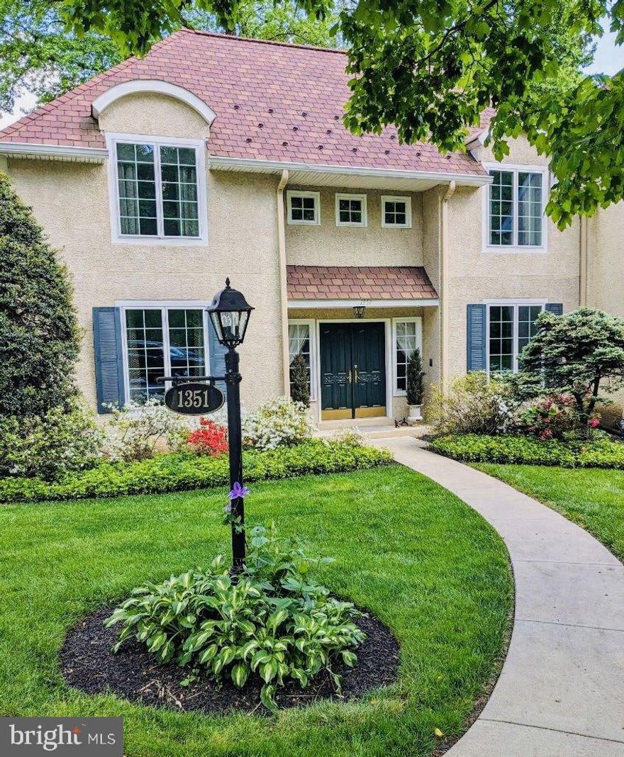 Welcome to this one-of-a-kind, enchanting end-unit carriage home, inspired by the historically preserved French Chateau once owned by Benjamin Rush III. Nestled in a picturesque, European-style neighborhood, this elegant residence is surrounded by protected wooded acres.

As you step inside, you’ll be greeted by 9-foot ceilings and turned steps adorned with beautiful crown moldings. The well-maintained home features a delightful dining room to your right, leading to a kitchen equipped with beautiful hardwood floors, granite counter tops, and stainless steel appliances. 
The kitchen seamlessly flows into a spacious family room, where cozy hardwood floors, fireplace, built-in shelves, and French doors create a warm and inviting ambiance.  Straight ahead, you will love another great room, a den with French doors leads to the patio. Step outside to discover a scenic, private, and wooded backyard oasis—a perfect retreat for relaxation, morning meditation, and enjoying your favorite book with a cup of coffee. This den can be turned into a first floor master suite bedroom, all you have to do is open make a door to the full bathroom.
The second floor houses the serene owner’s suite, complete with a walk-in closet, a window seat featuring cedar storage, and a luxurious bath boasting a whirlpool tub, shower stall, and double vanity. The second bedroom suite also offers a private bath, a walk-in closet, and convenient laundry facilities. Additionally, a third bedroom on the first floor provides flexibility and currently serves as an office.
You will enjoy the partially finished basement, it can be used for home office or family entertaining center with plenty  working space and storage.
The property includes a two-car garage, deeded separately. Whether from the patio or the balcony off the owner’s suite, you’ll appreciate the natural beauty of the wooded acres. 
What homeowners love about their home is that, the friendly neighbors have added to the joy of living in this community of ten town homes.  The HOA board insures that the ground, the common area and garages are well maintained. It is a convenient location and they have felt very safe leaving their home for extensive travel knowing everything would continue to be well cared for.
Ideally situated near Routes 100 and 202 in West Chester, this private and desirable setting awaits its fortunate new owner.
Call and make your appointment today!