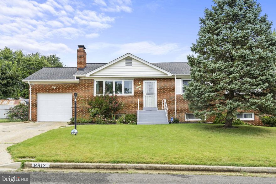 If you're looking for a rambler, this is the one.  Located in the Oak Orchard community, this beauty features a new roof, garage, wood flooring throughout the main level. Living room with wood burning fireplace. Spacious dining room that has an entrance to and from the garage. Kitchen has an eat-in area, new flooring, and a new stainless steel refrigerator. The main level also includes an updated bathroom, 3 bedrooms, including  the master bedroom with it's own full bathroom. Basement/lower level is very spacious. It has a family room/entertainment room w/ a wood burning fireplace, a spacious bedroom with a closet and, a large laundry room. The storage room is also located in the basement with a walkout basement door. The backyard  is gated with a shed.  Don't miss out on this gem. This property qualifies for the WELCOME HOME program by George Mason Mortgage . Which gives you up to $10,000 towards down-payment or closing cost. Offer deadline Sunday, September 3 at 7pm.