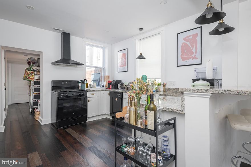 Prepare to  fall in love with this fantastic home.  Located in historic Fells Point; this end of group home has been renovated top to bottom.   Hardwood floors through out, open floor plan with a half bath on the main  level.  The chef's kitchen has tons of cabinets,  granite counters and breakfast bar.   En suite bedroom on the main level, with 2 upper level bedrooms with a full bath.   The location is every city lover's dream; just seconds to the water,  dining, shopping and more!     AVAILABLE SEPTEMBER  3d   No pets