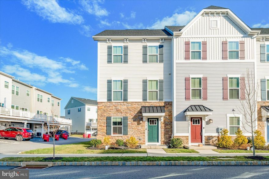 Stellar opportunity to enjoy life in the highly desirable Atwater community with maintenance free living, walking trails, steps away from popular parks, shopping and restaurants! This end unit Strauss Model offers 3 bed 2.5 bath. The airy front door foyer leads to a large open space that can also be used as an office/entertaining/multi-functional room and with a large storage closet. Main level showcases living, dining, half bath and an expansive open kitchen, with an oversized gourmet island with granite countertops and stainless steel appliances. Entire main level offers easy to maintain hardwood floors and carpet. A double patio door off the morning room leads to a huge deck where one can relax and enjoy a morning coffee or Bbq with friends and family. Abundant natural light, open floor plan and 9' ceilings on this level, makes it feel bright and airy. Upstairs is a spacious owner's retreat with an en-suite bathroom featuring a separate glass stall shower, soaking tub, and double bowl sinks, with a large walk-in closet. The laundry, two additional bedrooms, and a hall bath are also conveniently located on the upper level. Refrigerator, Washer and Dryer are included.