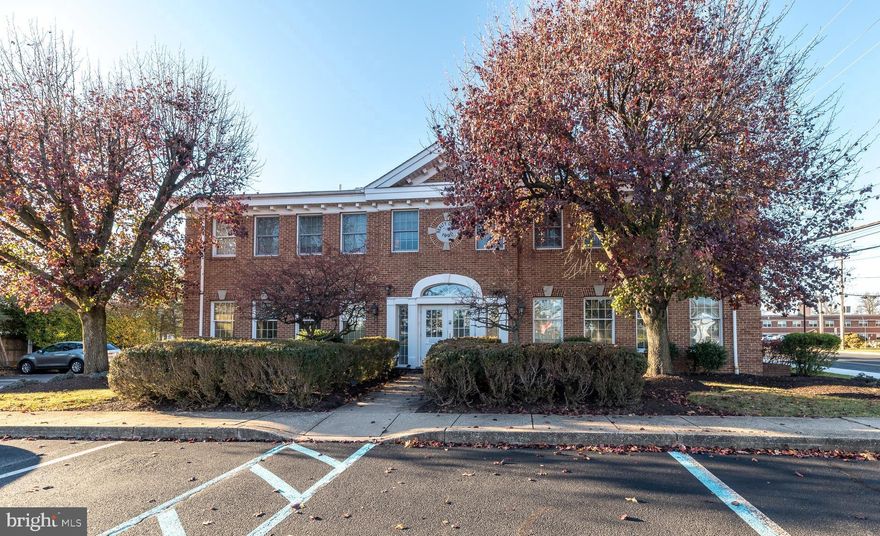 This unique office and income producing apartments.  There is 4882 square feet of office space and four two bedroom apartments.   The building is brick on all sides, with 4 fronts,  and is fashioned after the historic Carpenter's Hall in Old City, Philadelphia where the Declaration of Independence was signed in 1776.  Solid investment consisting of 3782 square feet of open 1st floor office space, There is a total of 2 executive offices, 4 private offices and 2 conference rooms in the front offices.  In the rear there is 3 private offices and a huge open multi-purpose space.  The right rear wing consists of 5 private offices.   For a total of 13, 1st floor private offices.  There is also approximately 1100 square feet of office in  lower level with huge open training room and 4 private offices.  Upstairs there are and four two bedroom apartments. Separate gas, electric, water & sewer meters for each occupant to pay their own utilities. Each apartment has a basement storage room and coin operated laundry for tenants use.