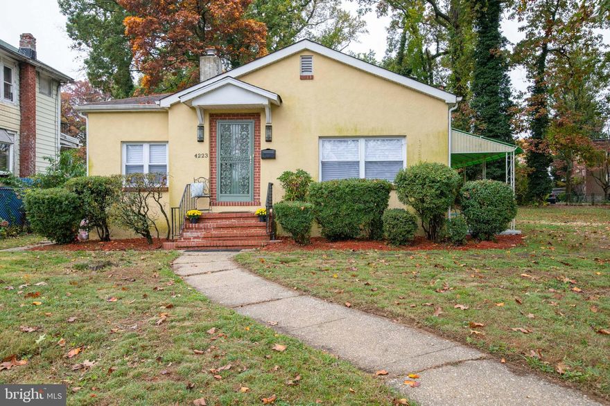The ultimate retreat. This Spanish style home is situated on a large corner lot in the West Arlington community of Baltimore City and has all that you need to enjoy life to its fullest. A beautiful stucco exterior, decorative wrought iron entryways, gorgeous wooden doors, and elaborate ornamental light fixtures complete the aesthetic.   Inspire your inner chef in the fully equipped kitchen with granite countertops and ceramic tile backsplash. Generous open living and dining space for entertaining. Minimal stairs make living here easy.  Lots of spaces to enjoy outdoor living. French doors lead to a covered patio. Backyard offers privacy and plenty of space for social gatherings. Outdoor movie night or kick back and enjoy rest, relaxation, and shade from trees while on the deck.   This home exudes comfort and warmth. Make an offer and make it your own!