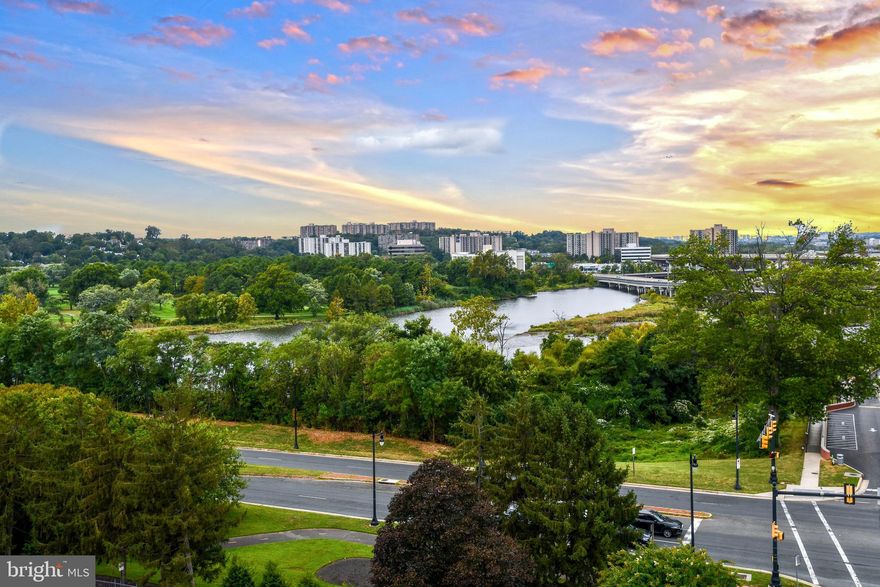 DARE TO COMPARE— THE BEST VALUE IN ALL OF OLD TOWN WITH OVER 1,325 SF!!  Plus sellers are offering a $10,000 closing cost credit for new kitchen appliances at settlement with an acceptable offer. Don't miss this opportunity to make this penthouse condo sunset views yours. You’ll feel right at home in this inviting two-bedroom residence in prestigious Porto Vecchio. Experience refined living with unobstructed vistas from every room. All windows and doors have been replaced, ensuring energy efficiency and a serene retreat from the bustle of daily life. Enjoy quiet evenings by the wood-burning fireplace or coffee in the sun-filled enclosed solarium. Freshly painted and with new carpet, this one-level home blends comfort with timeless appeal. 
The spacious living room with wood-burning fireplace flows seamlessly into the dining area, perfect for entertaining. Both the kitchen and primary bath were thoughtfully remodeled by Alexandria Kitchen & Bath, blending timeless style with modern convenience. Additional highlights include a versatile second bedroom or office with built-in cabinetry,  a second full bath, excellent closet space, two side by side garage spaces (#71 & #72), and a storage bin in the garage.

This residence represents exceptional value in Old Town Alexandria’s premier luxury waterfront building. Porto Vecchio offers resort-style living with unmatched amenities: private transportation service, on-site management, elegant party rooms,  renovated fitness centers, security, and a warm, welcoming community. Outdoor enthusiasts will enjoy the private tennis court, kayak dock, and riverside pool.

Don’t miss the chance to make Porto Vecchio your new home—where every day feels like a getaway.