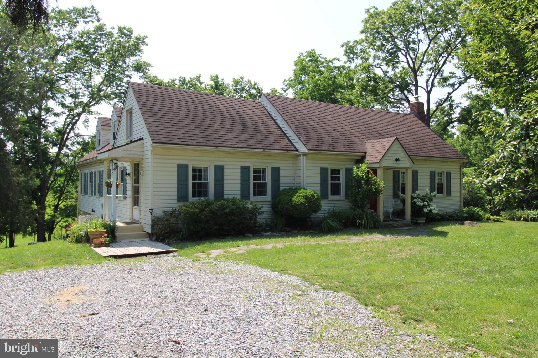 Beautiful cottage style property located in Boonsboro, MD on 1.3 acres. Relax outside in the large yard using the firepit or enjoy the walking areas surrounding the house. Property is warm and inviting inside, from years of upkeep by the owners. Plenty of space for any family activities inside, with both fireplaces ready for tenant use and a rear deck off the kitchen!