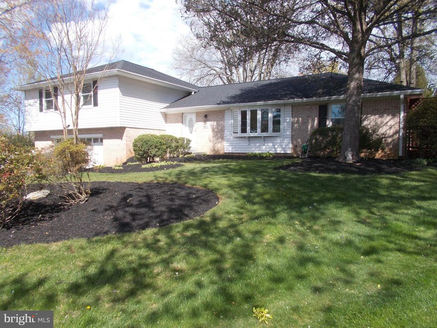 Effectively brand new, this gorgeous home has been expertly up-dated  to include:  completely renovated kitchen with brand new SS appliances,  quartz countertops, over-size farmhouse style sink, new cabinets with stunning hardware accents, and under-cabinet lighting; newly refinished, very rich hardwood flooring on main and upper levels; many new lighting fixtures throughout; upgraded bathrooms; 2024 new hip roof, new soffiting and over-size gutters/downspouts;  new HVAC;  new hot water heater; fresh paint throughout main and upper levels, garage and basement; freshly landscaped for ultimate curb appeal.  Living room boasts bay window with garden views.  Family room's box window over-looks beautiful backyard -- space for play equipment and playing ball.  Stay warm and cozy in colder months with wood-burning brick fireplace, complete with slate-seated raised hearth.  Bonus recreation room with attached full bath , walk-in closet, and walk-out sliding glass doors to backyard.  Enormous deck connected closely to kitchen for easy entertaining. Large, level lot with fully fenced backyard and over-size decking, this stately gem is located at the end of a quiet cul-de-sac.  Freshly painted gigantic garage with side-door exit and HUGE basement for storage or game-room.  Check out the schools -- you'll not be disappointed as they're all top-notch! Sign up for the community pool to enjoy summer fun-in-the-sun!  Welcome to you, and yours'...  ;-)