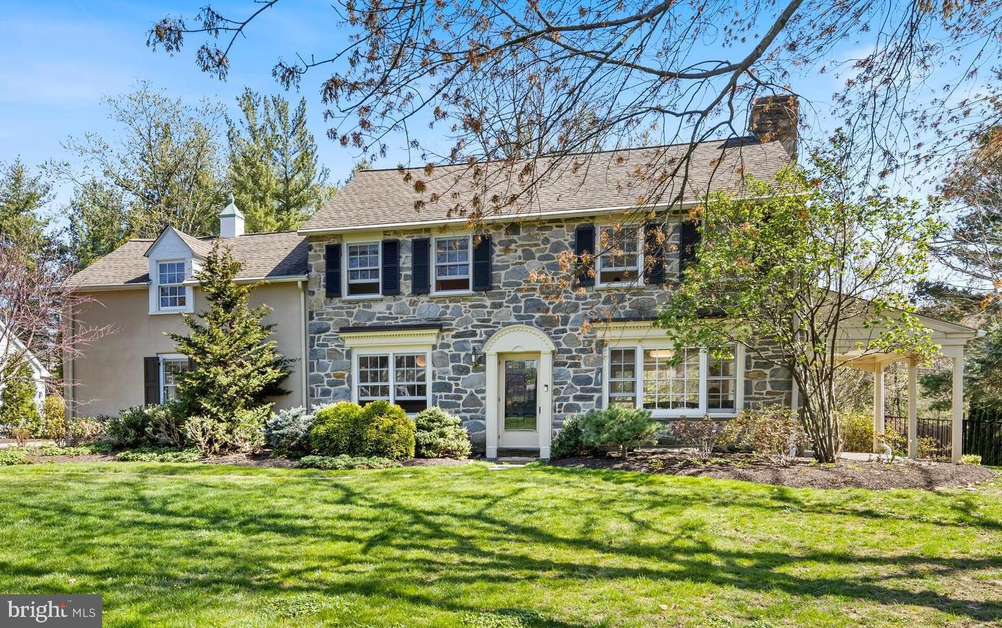 Classic 4 BD, 3.5 BA stone colonial in one of Radnor Twp's most popular neighborhoods! this lovely home has a 2-story addition which expanded the Kitchen & Breakfast Room, and added a first floor rear Mudroom with great walk-in closet, Laundry Room & Powder Room. The Primary Bedroom was also renovated to enlarge the Primary Bathroom. Renovations expanded Bedroom 2, so that it features an en suite full Bathroom. The entire home boasts hardwood floors, updated light fixtures, neutral paint, many deep window sills, and an open flow... great for both formal entertaining & casual family living. Gracious Living Room w/fireplace, built-ins, & entrance to covered side patio (which could easily be enclosed to create a private Office/Study.) Formal Dining Room is currently being used as a main floor Study. There is circular flow to a very large, spacious Family Room. The Kitchen features cherry cabinets, menu planning desk, granite counters, & stainless appliances and is open to a sunny Breakfast Room with sliding door to rear patio & yard. Primary BD w/walk-in closet, a lovely Primary BA with wide vanity, glass shower enclosure and private toilet room. Bedroom 2 has an en suite full BA with stall shower. Bedrooms 3 and 4 share a 3rd full hall BA with tub. Several hall closets provide ample storage and there is a rear staircase to the first floor (making Bedroom 4 ideal for guests/in-laws/au pair.) Finished LL Rec Room offers an egress-compliant window, tile floor, & built-ins. Large unfinished Storage Room houses the newer 2-zone HVAC system, hot water heater. The basement has been waterproofed w/battery back-up and hard-wired portable generator panel. Add'l insulation was added and a water filtration system. Two large flagstone Patios offer great space for outdoor entertaining and scenic views of the sparkling new inground pool and nearly half acre, private yard. The pool has a built-in, retractable, very sturdy cover that can be easily closed when not in use so that the yard is safe for kids and pets. The sought-after Meadowood/Browning Lane neighborhood is within Radnor Elementary School boundaries & is walking distance to restaurants, train stations, Villanova Univ, Agnes Irwin School, parks & playgrounds. EZ access to Blue Rte, Airport, Center City, and shops & restaurants in Wayne & Bryn Mawr. Showings start Thursday April 20th!