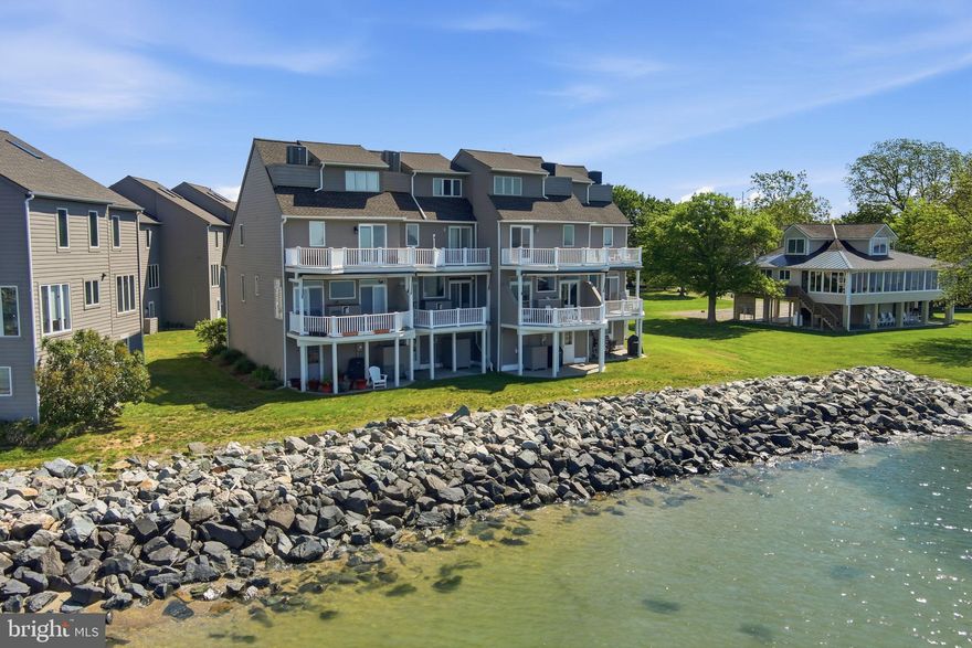 Bayfront condo with exceptional views, located in the heart of Rock Hall! 
Beautiful open living space for entertaining, featuring a propane fireplace and bayfront balcony with awning. The eat-in kitchen features updated countertops and a Bosch electric range. 
The primary bedroom has its own bayfront balcony and an updated attached bathroom. Two additional bedrooms share a full bathroom. The third-floor bedroom has a fantastic view and could be used as an office, studio, or overflow space for guests . On the ground floor, the bayfront storage room is a great space to keep fishing poles, kayak, or pool floaties to use at the condo pool! One-car garage with additional outside parking, as well as communal overflow space for guests. 
Tilghman’s Landing condo is a beautiful waterfront condo association! Located in the heart of everything, yet tucked away from the hustle and bustle. Enjoy the pool in the summertime and never miss a sunset on the balcony.  A sandy beach is located just outside the association, and the Rock Hall beach is just down the street. Short distance to ample restaurants, shops, and marinas.