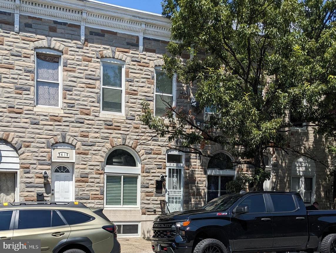 Beautifully RENOVATED home in Baltimore Highlands. GORGEOUS kitchen with granite counters and Granite Island. New APPLIANCES including new dishwasher, GAS RANGE, built-in microwave, and refrigerator. RENOVATED FULL BATHS upstairs AND in the basement. LUXURIOUS TILE WORK in the bathrooms with glass sliding doors and built-in soap shelf. UPSTAIRS has 2 BEDROOMS PLUS a BONUS ROOM for home office or TV ROOM. Think of it as a SECOND living room upstairs!!! Finished basement with FAMILY ROOM, FULL BATHROOM, washer/dryer hook ups, and walkout door to the backyard. Fenced backyard. Street Parking. Welcome HOME!