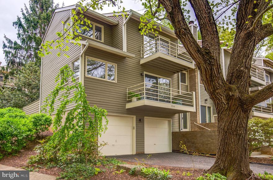 DESIRABLE LAKEPORT END UNIT WITH LOADS OF LIGHT, PRIVATE BALCONIES  AND UPGRADES GALORE! Offered at $895,000, this exceptional three-bedroom, 2.5-bath end-unit home in Reston’s highly sought-after Lakeport community blends modern updates with a serene lake lifestyle. While not waterfront, the home enjoys beautiful partial lake views from both the living room and the spacious primary suite, creating a tranquil backdrop for everyday living.
Light-filled and inviting, the oversized living room features abundant natural light and upgraded LED lighting, flowing seamlessly into the dining area—ideal for both entertaining and comfortable daily living. The renovated kitchen is a true highlight, showcasing granite countertops, stainless steel appliances, and a striking tile backsplash.
Extensive updates throughout include wide plank engineered hardwood flooring across the main level, lower level, and stairs, while the entire upper level (excluding bathrooms) features brand-new carpet. Fresh paint throughout enhances the home’s bright, modern feel. All bathrooms have been thoughtfully updated with new tile, quartz countertops, stylish lighting, and contemporary plumbing fixtures. The HVAC system is new and windows have been replaced. 
Enjoy outdoor living with two private balconies—one off the living room and one off the primary suite—perfect for taking in the water views. A private, fenced rear yard with deck offers additional space for relaxing or entertaining. The home also features a spacious two-car garage and attractive landscaping that enhances its curb appeal.
Located in one of Reston’s most desirable lake communities, residents enjoy scenic walking paths (walkable to lake, grocery, restaurant and shops) community amenities, and convenient access to shopping, dining, and major commuter routes. Metro is less than a mile away.
A rare opportunity to own a beautifully updated, light-filled home with lake views in a premier location.