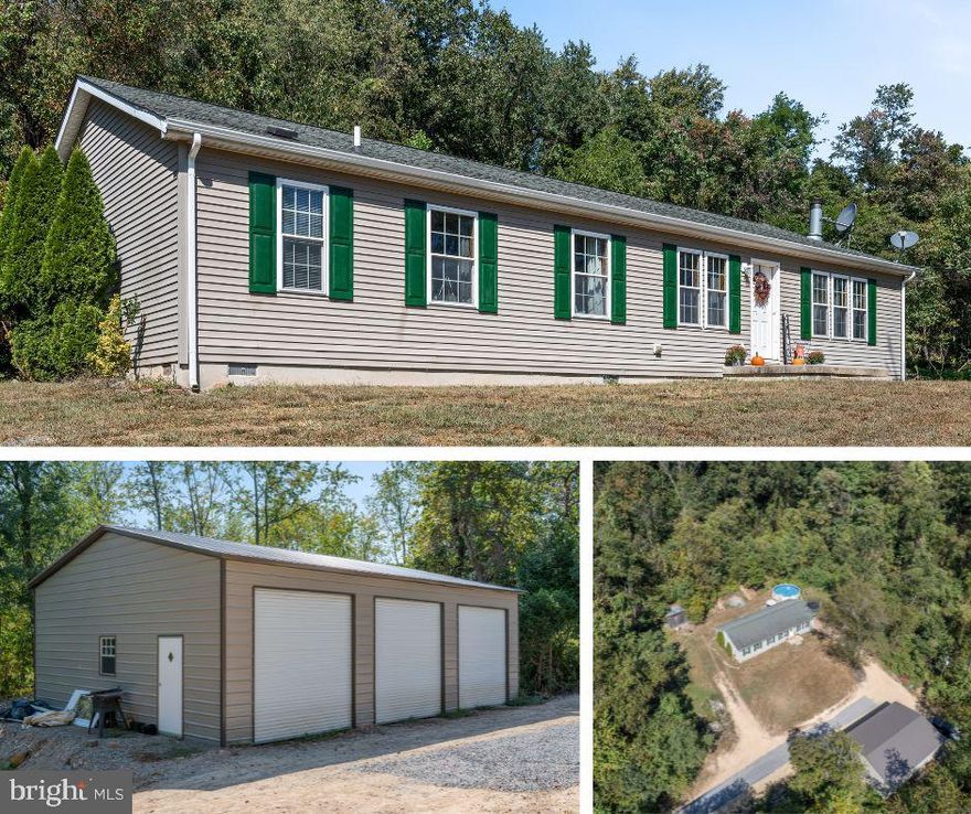 This one checks all the boxes. Discover the perfect blend of comfort and privacy in this charming 3-bedroom, 2-bath rancher situated on 2.5 secluded acres. Step inside to find an inviting open-concept layout highlighted by a beautiful stone wood-burning fireplace, ideal for cozy evenings at home. The spacious kitchen and living areas make entertaining effortless, while large windows fill the home with natural light and serene views of the surrounding property.

Outdoors, enjoy summer days in the above-ground pool or relax on your private acreage. You will love the oversized detached garage with 12-foot ceilings, offering plenty of room for vehicles, storage, or a workshop and there are even chicken coops for your feathered friends.

This property combines country living with modern conveniences—whether you’re gathering by the fire, hosting friends by the pool, or making use of the expansive garage, this home has something for everyone in your family.