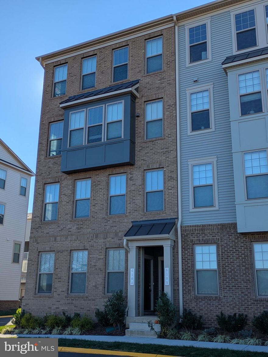Almost new, 2 years young,  beautiful large end unit 2 level  3 bedroom 2.5 bath 1 car garage townhome-style condo  in The Village at Manassas Park.  Walking distance to the VRE, shopping and restaurants.  Available in January.  You will not be disappointed.