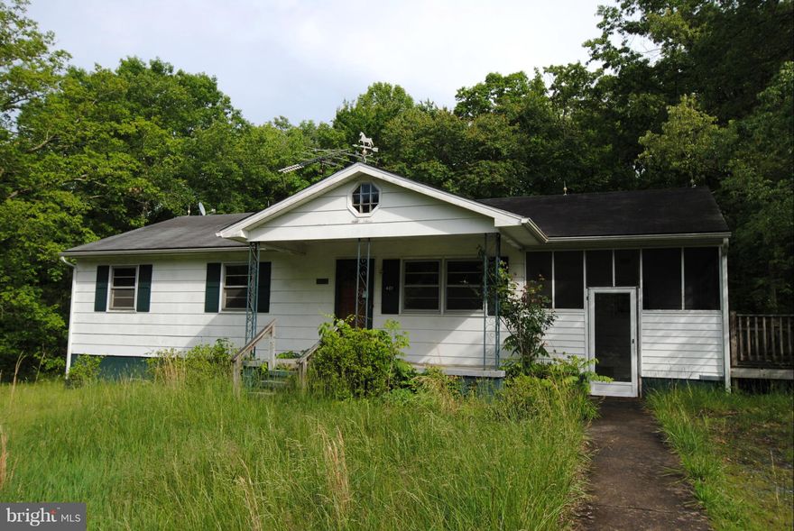 What a great find, located on spacious corner lot just a few miles from Gordonsville! This home features 3 bedrooms (master has en-suite half bath), two living areas, dining, kitchen, a full bath on the main level. Basement offers tons of potential with kitchenette area, full bath, and walk out to back yard. Outdoor living is easy with wood deck and enclosed porch.